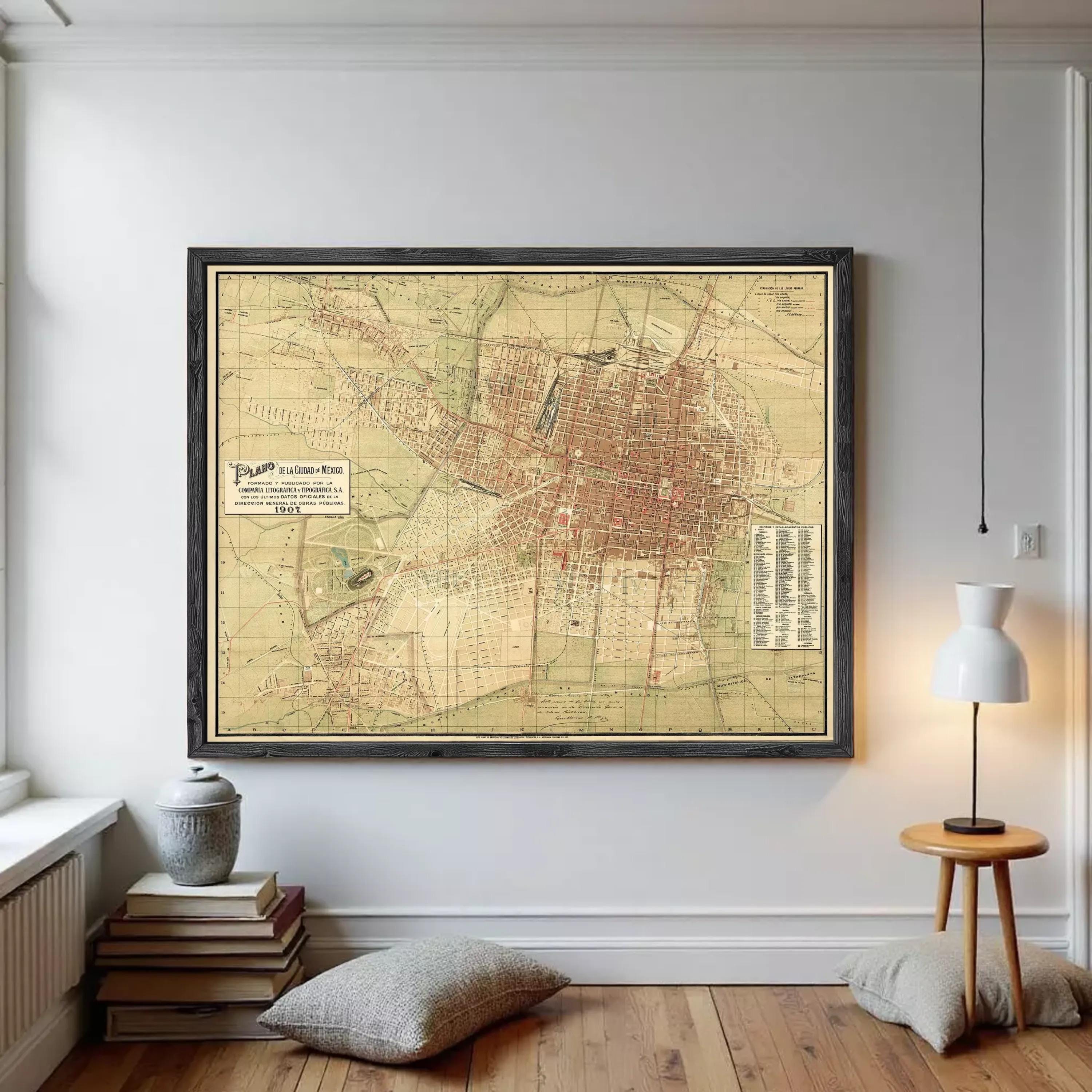The image is a framed vintage map of a city, likely from the early 20th century, depicting the layout and streets of the area.