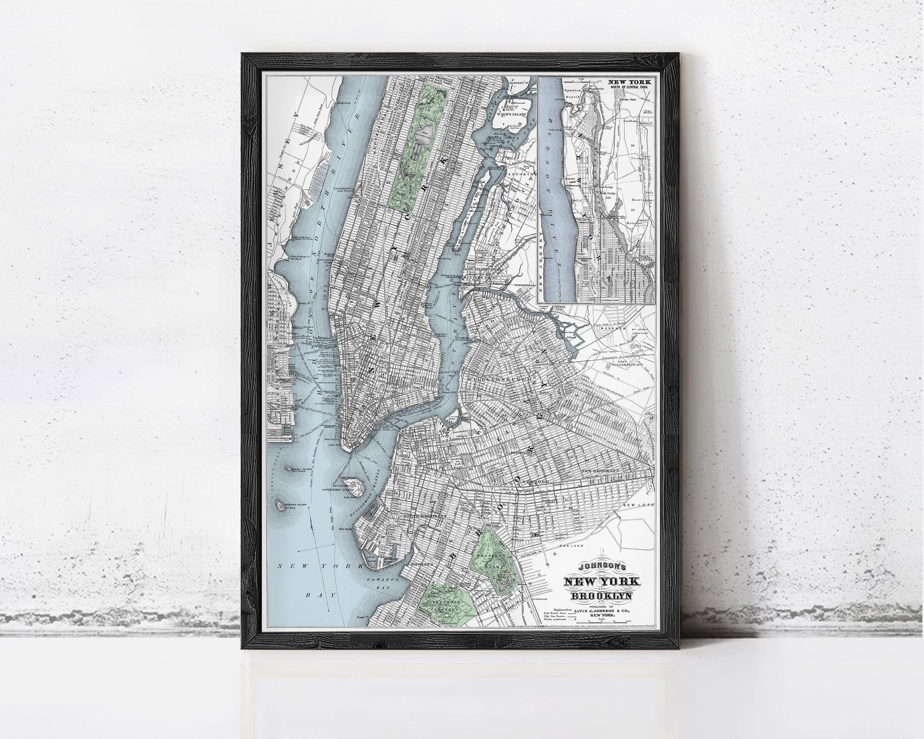 The image is a framed map of New York City, depicting the city's streets, waterways, and surrounding areas.