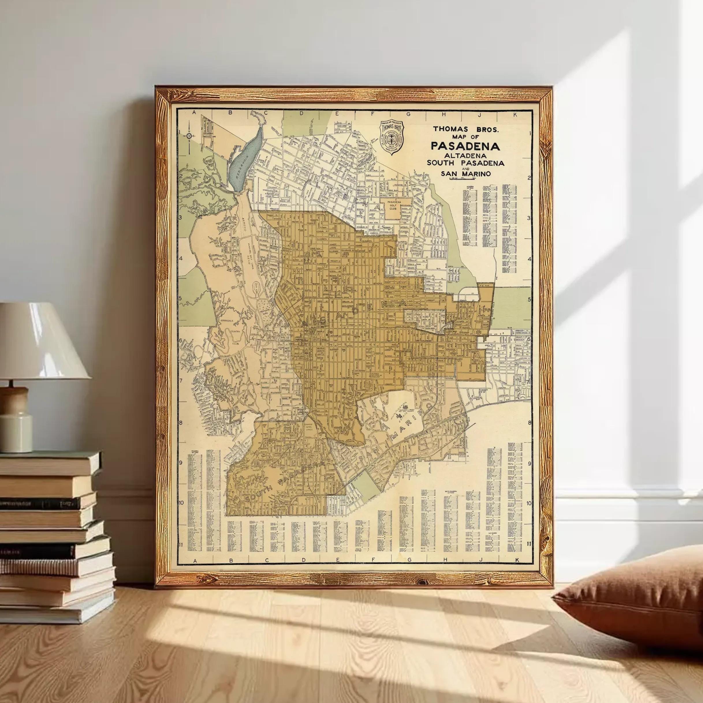 The image is a framed vintage map of the city of Pasadena, California, with a wooden frame.