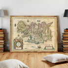 The image is a framed vintage map of Iceland, featuring detailed geographical information and labeled with various locations and landmarks.