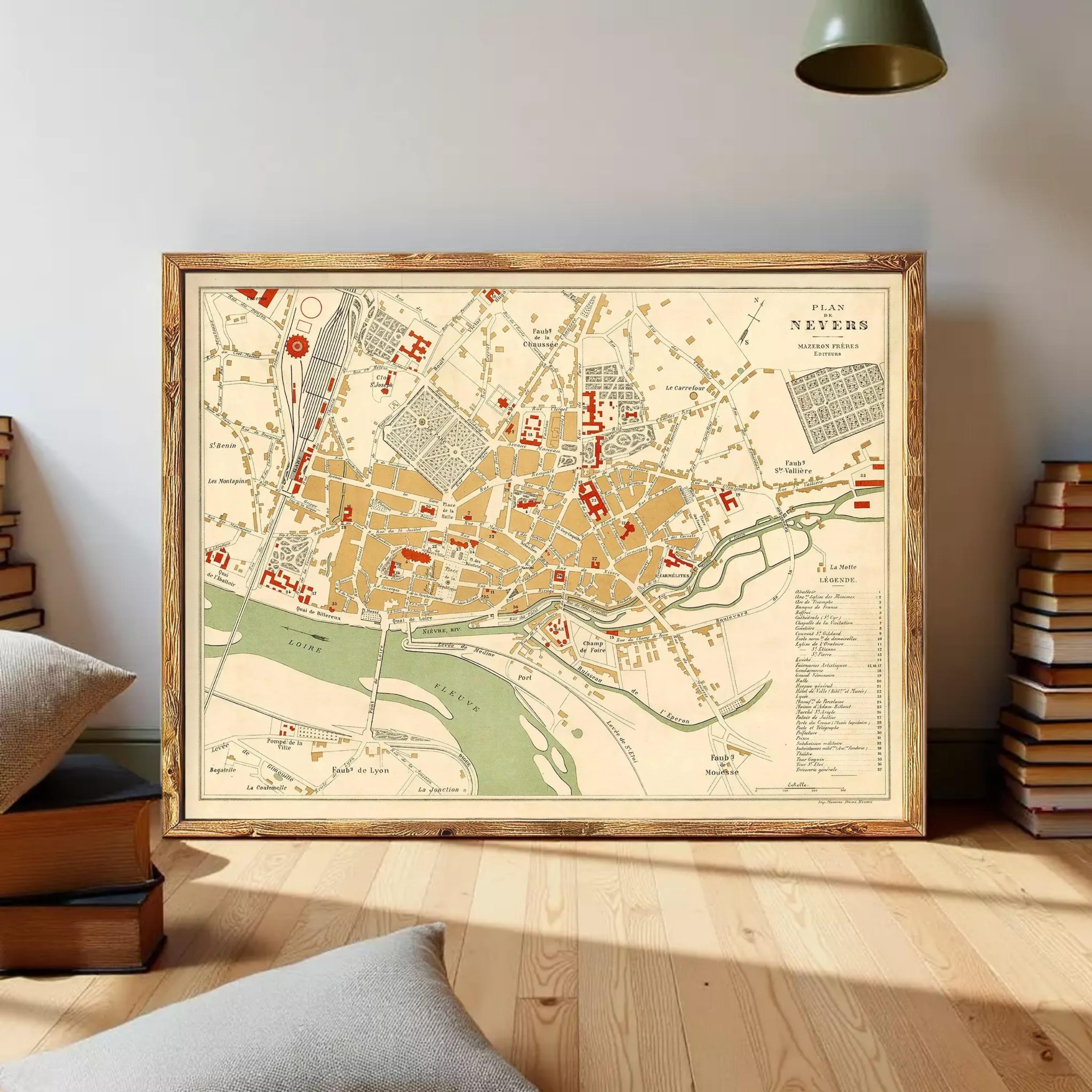 The image is a framed vintage map of a city, likely from the 19th century, depicting a detailed layout of streets, buildings, and other landmarks.