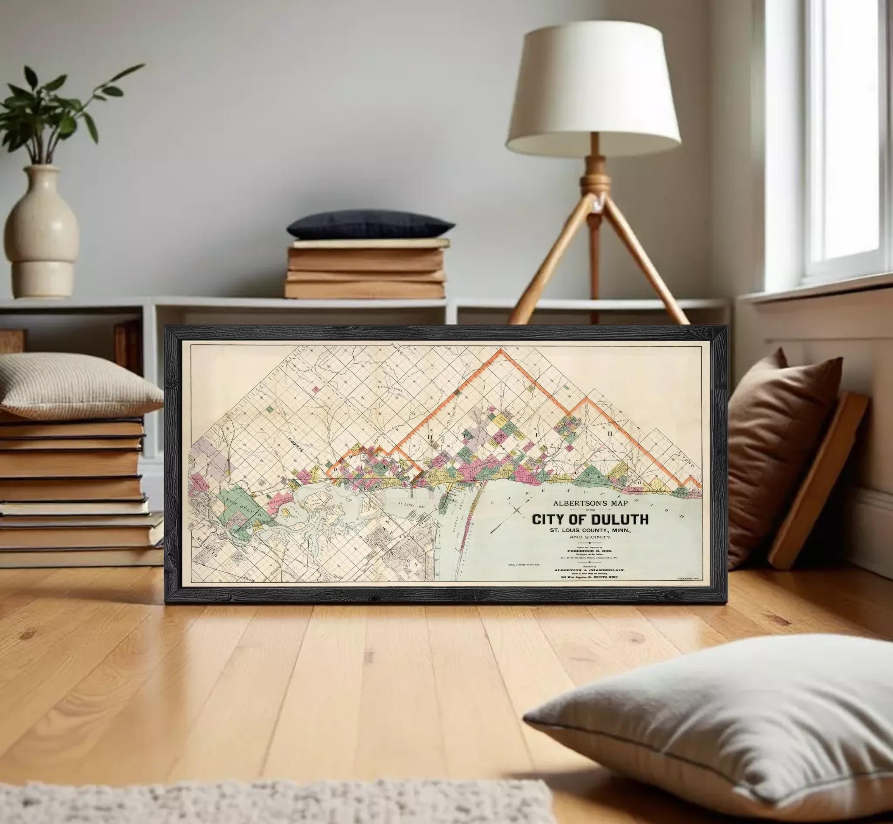 A framed map of the City of Duluth, Minnesota, depicting the city's layout and surrounding areas.