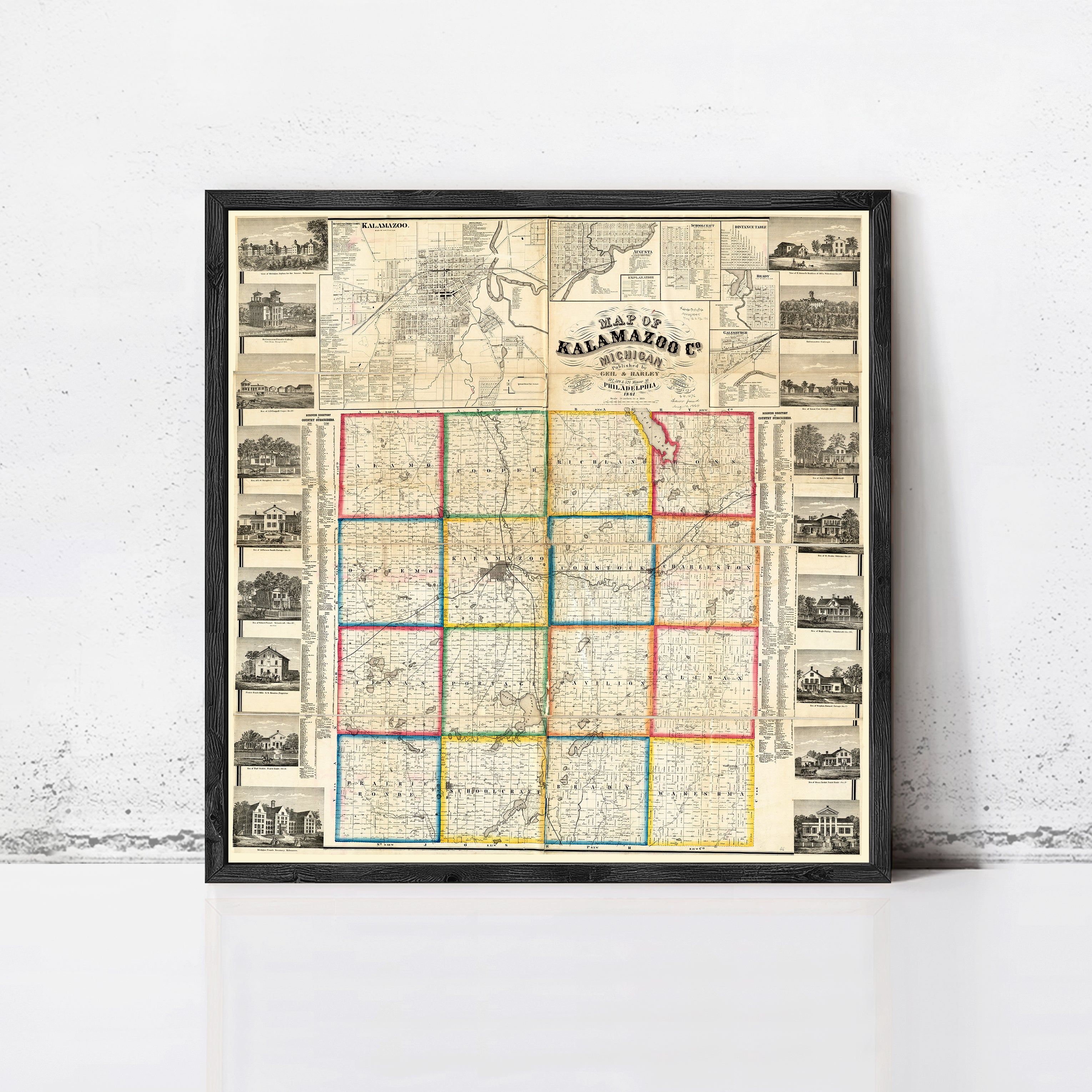 The image is a framed vintage map of the state of Kansas, with a black border and colorful grid lines.