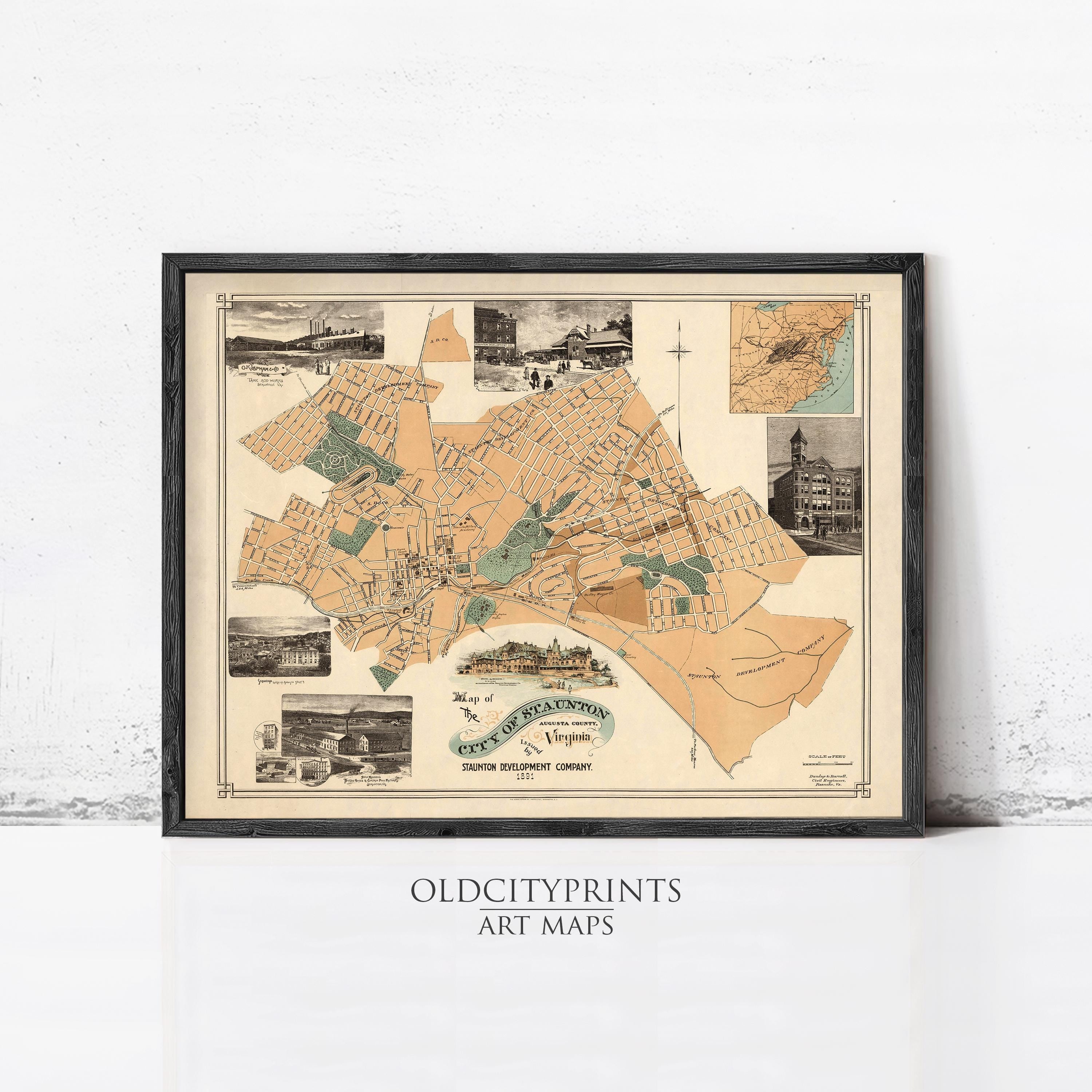 The image is a framed vintage map of the city of Philadelphia, Pennsylvania, depicting various landmarks and streets.