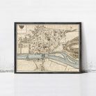The image is a framed map of the city of Rouen, France, depicting the city's layout and surrounding areas.