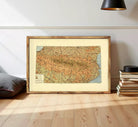 The image is a framed vintage map of Europe, depicting various countries and regions in a detailed and colorful manner.