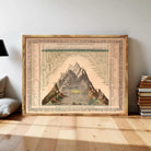 The image is a framed illustration depicting a mountain range with various peaks and valleys.