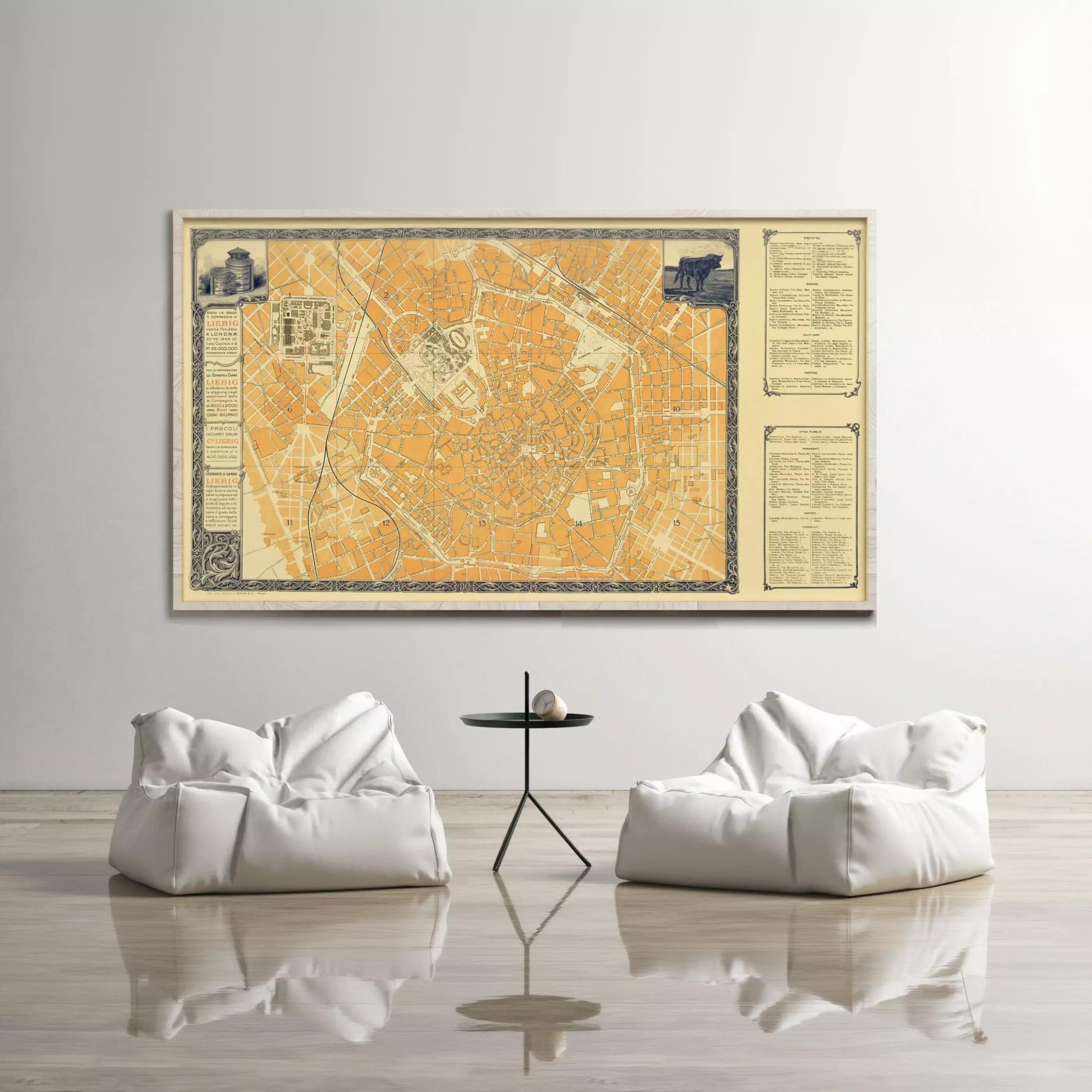 a large wall-mounted map of a city, with two white bean bag chairs positioned in front of it, creating a cozy seating area.