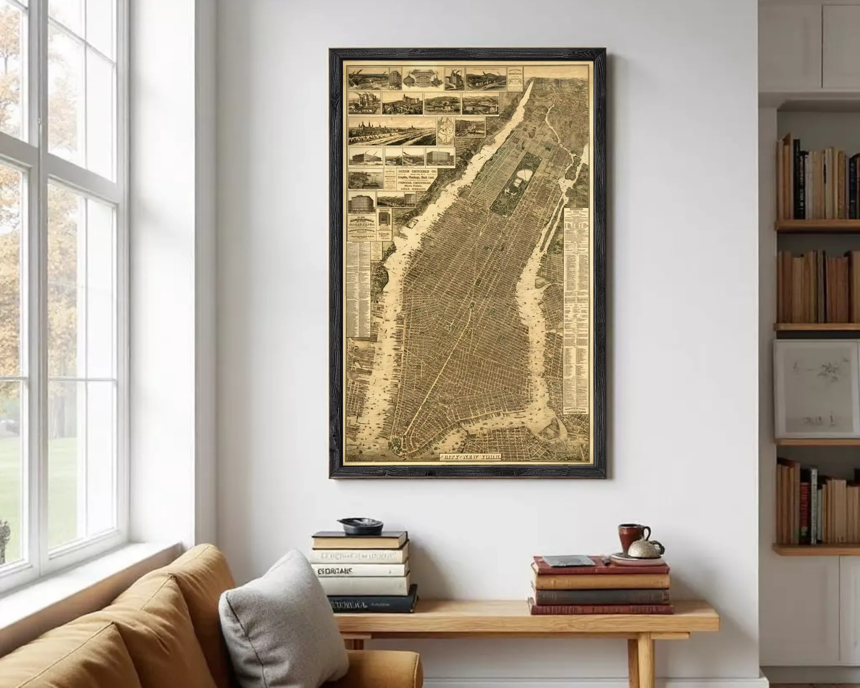 The image is a framed vintage map of New York City, depicting various landmarks and streets in a detailed and intricate manner.