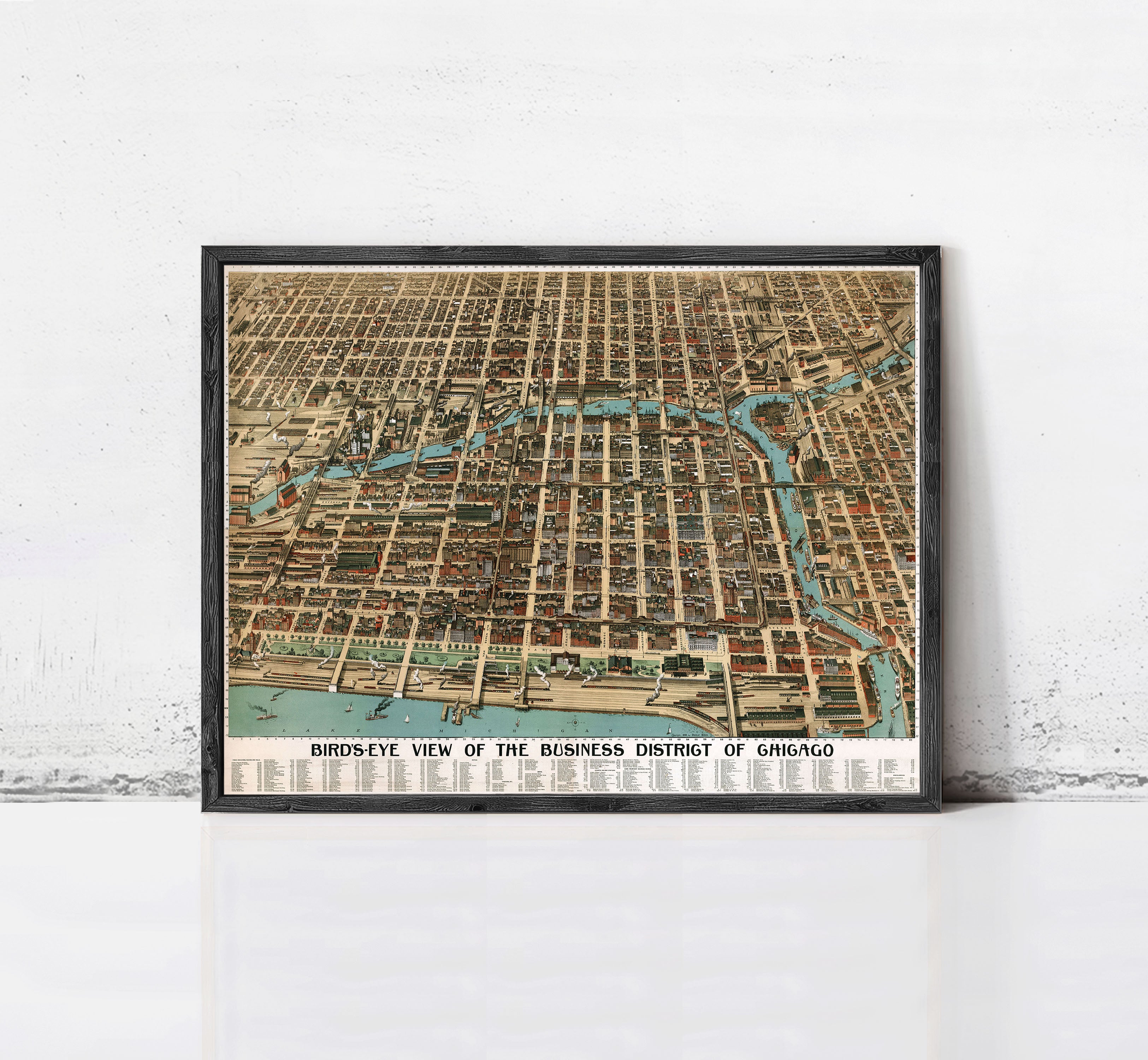 The image is a framed vintage map of Chicago, Illinois, depicting the city's business district.