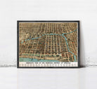 The image is a framed vintage map of Chicago, Illinois, depicting the city's business district.