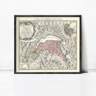 The image is a framed vintage map of Europe, depicting various countries and regions in a detailed and intricate manner.