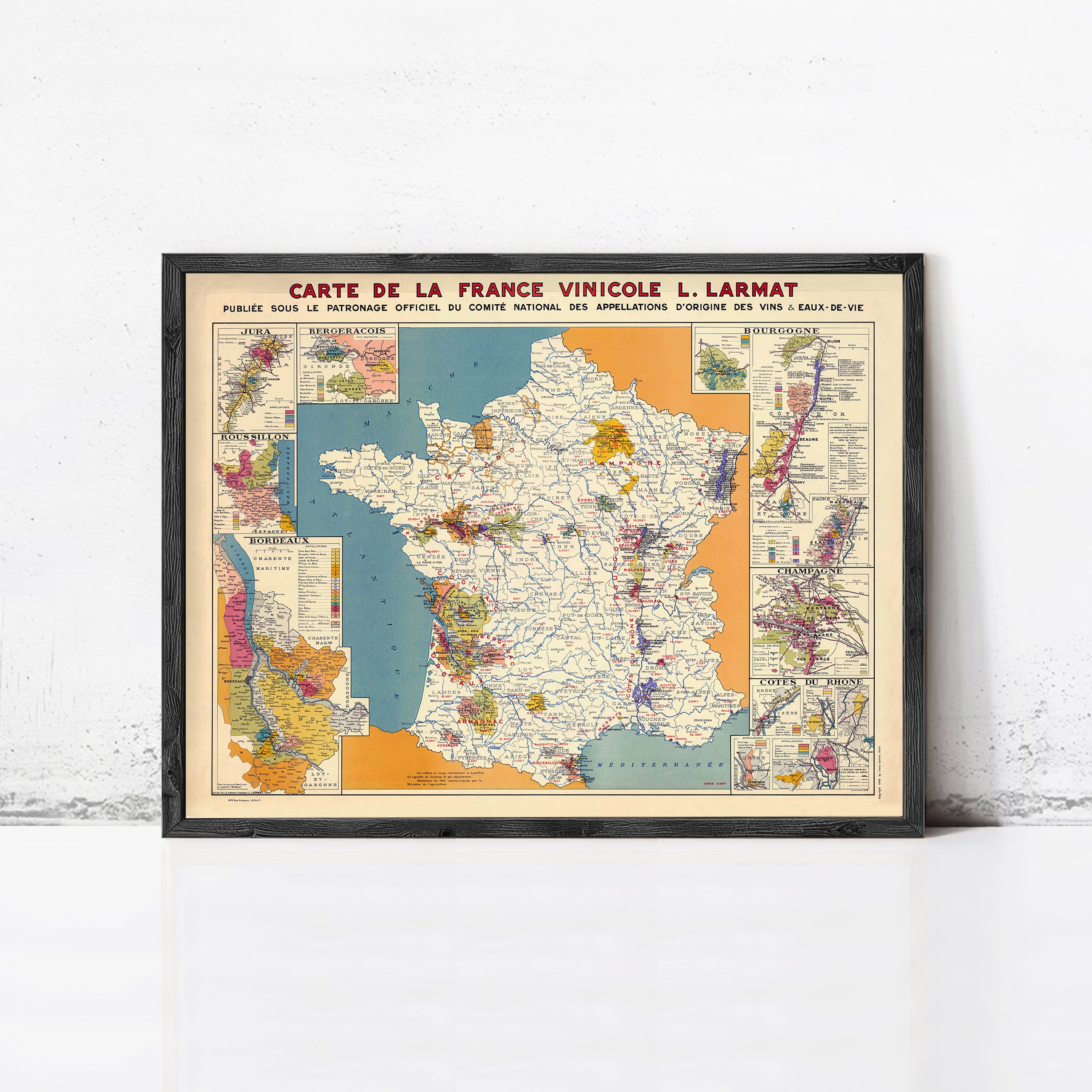 The image is a framed vintage map of France, depicting various regions and their geographical features.