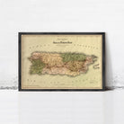 The image is a framed vintage map of Puerto Rico, depicting the island's geographical layout and surrounding areas.