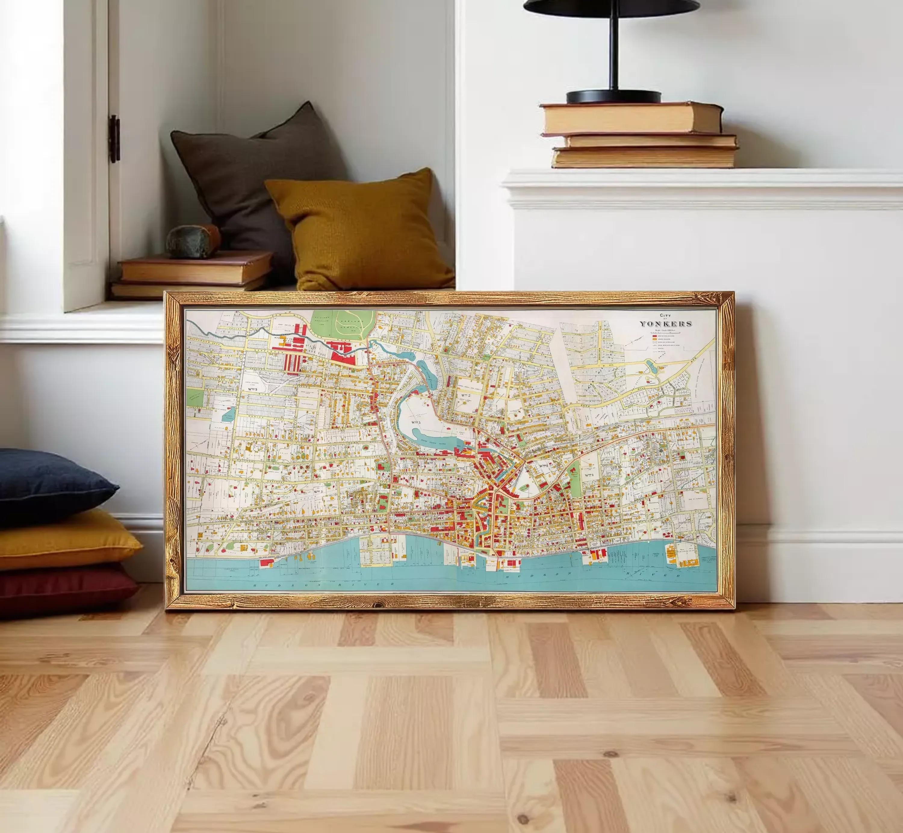 The image is a framed map of a city, likely showing a detailed layout of streets, landmarks, and other geographical features.