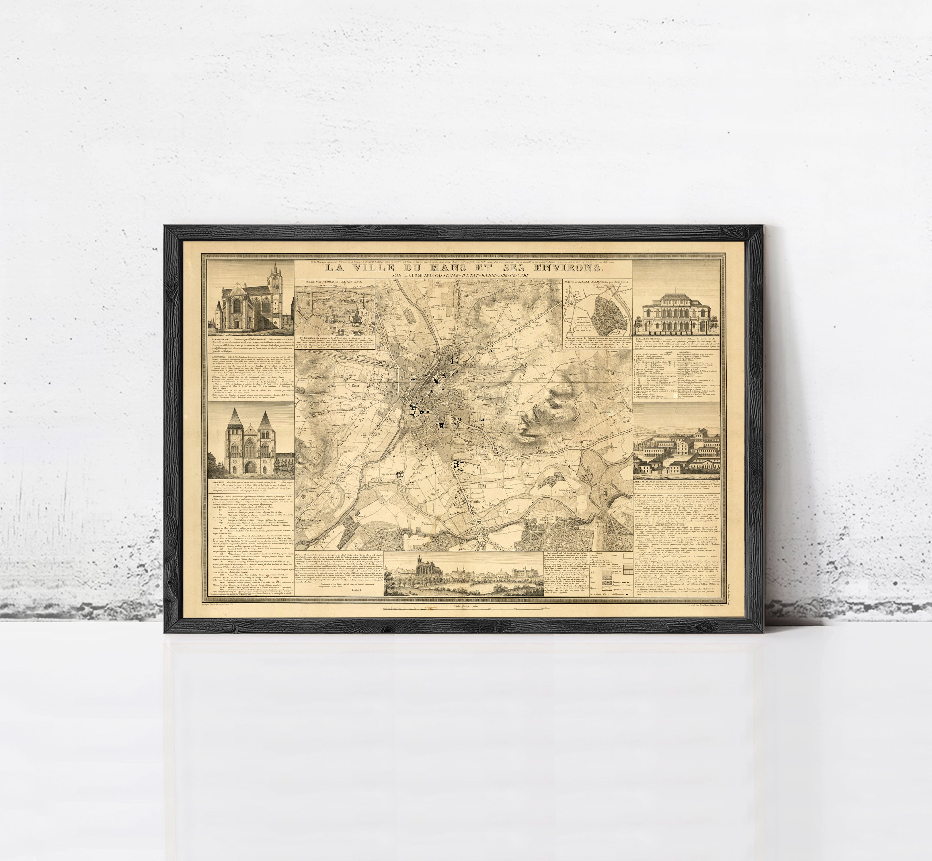 The image is a framed vintage map of a city, depicting various landmarks and locations.