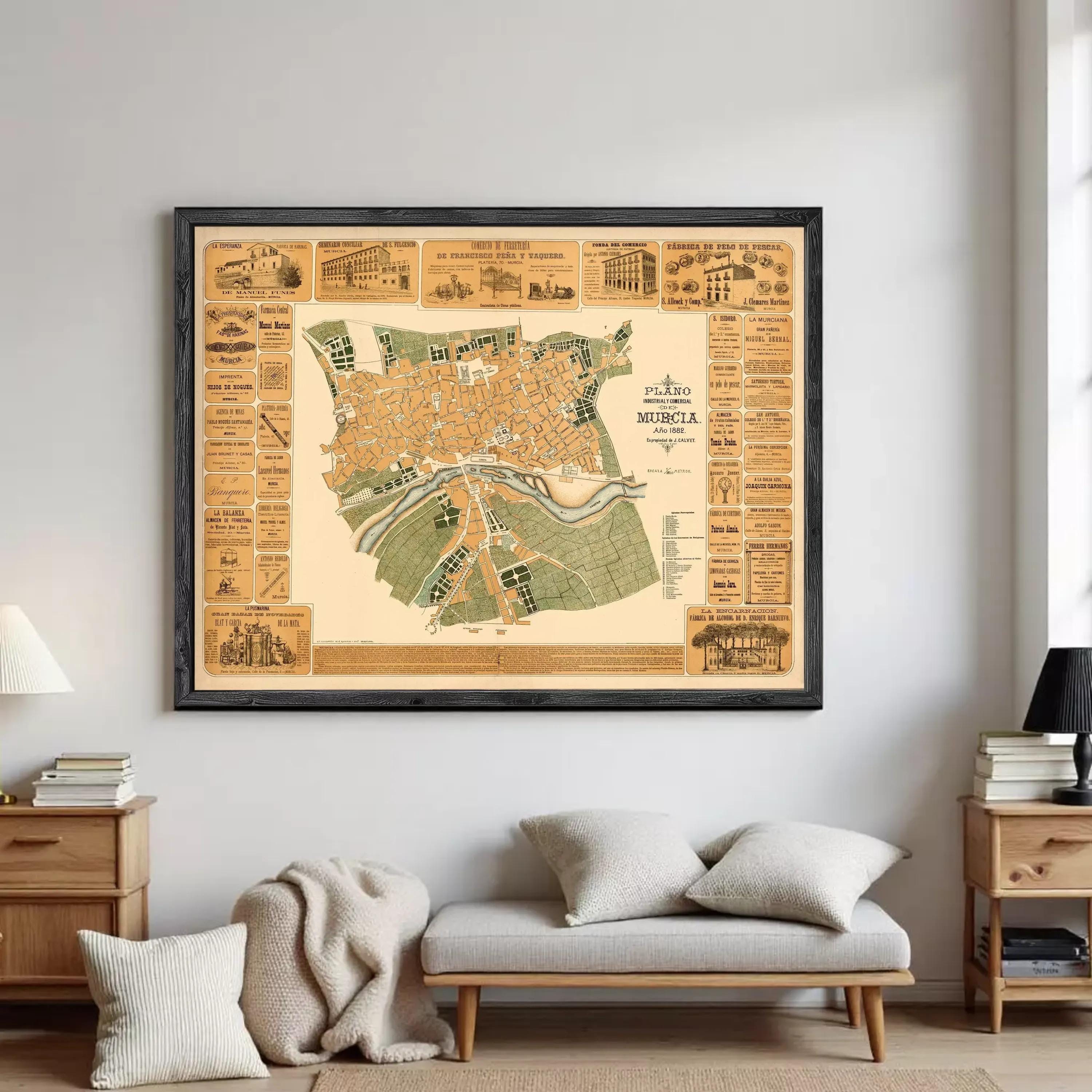 The image is a framed vintage map of a city, likely from the 19th century, with various landmarks and streets labeled.