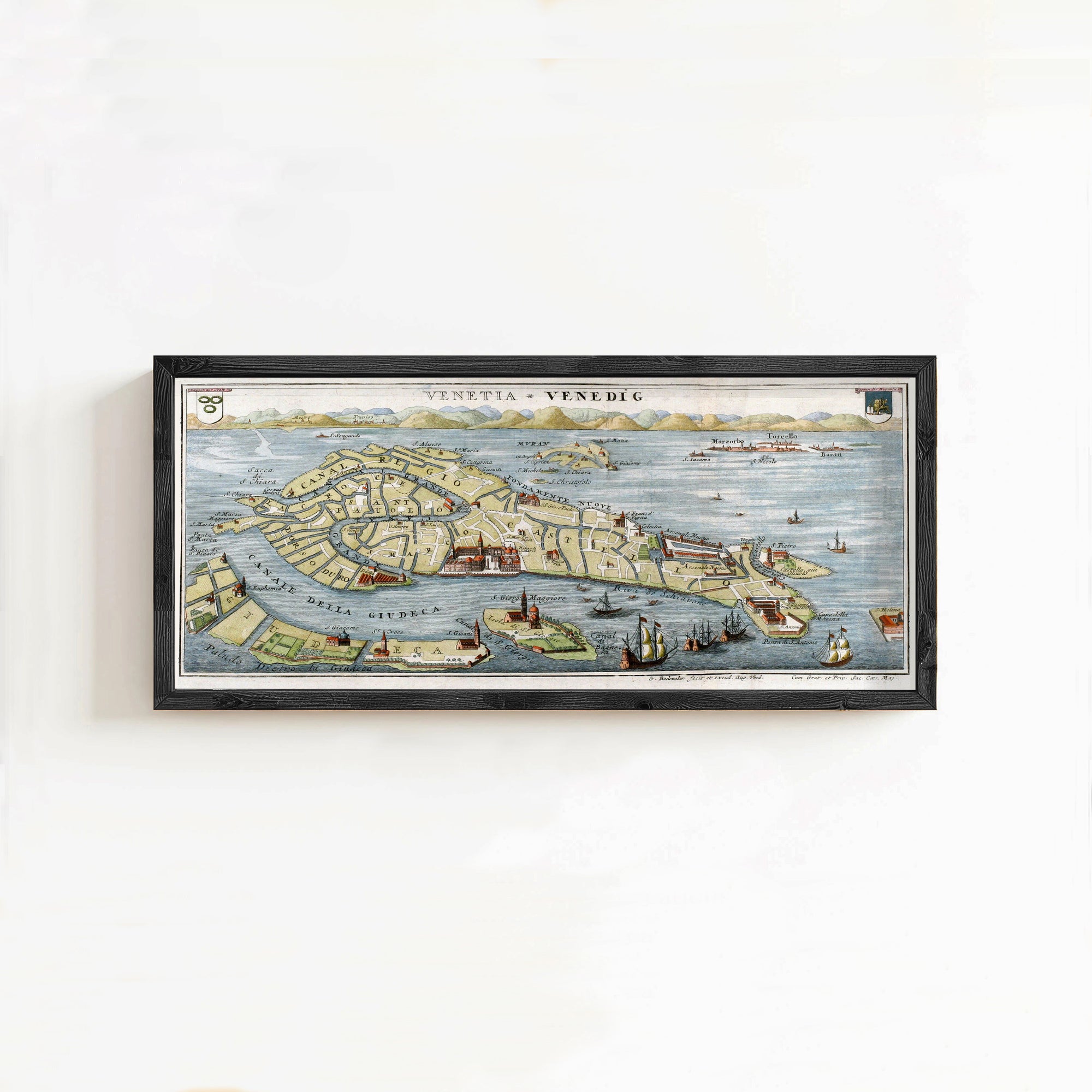 The image is a framed map of Venice, Italy, depicting the city's layout and surrounding areas.