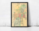 The image is a framed vintage map of the town of Hartford, Connecticut, showing the layout of the streets, neighborhoods, and other geographical features.