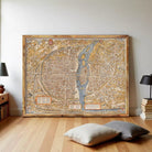 a large, ornate map of a city displayed on a wall in a room.