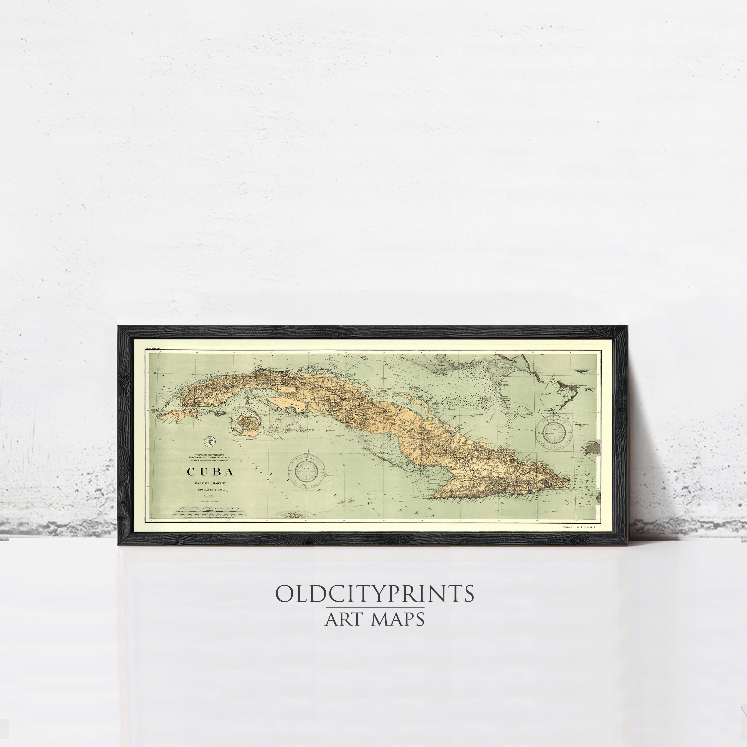 A framed vintage map of Cuba, with the text "Cuba" and "Old Cityprints ART MAPS" printed on the bottom of the frame.