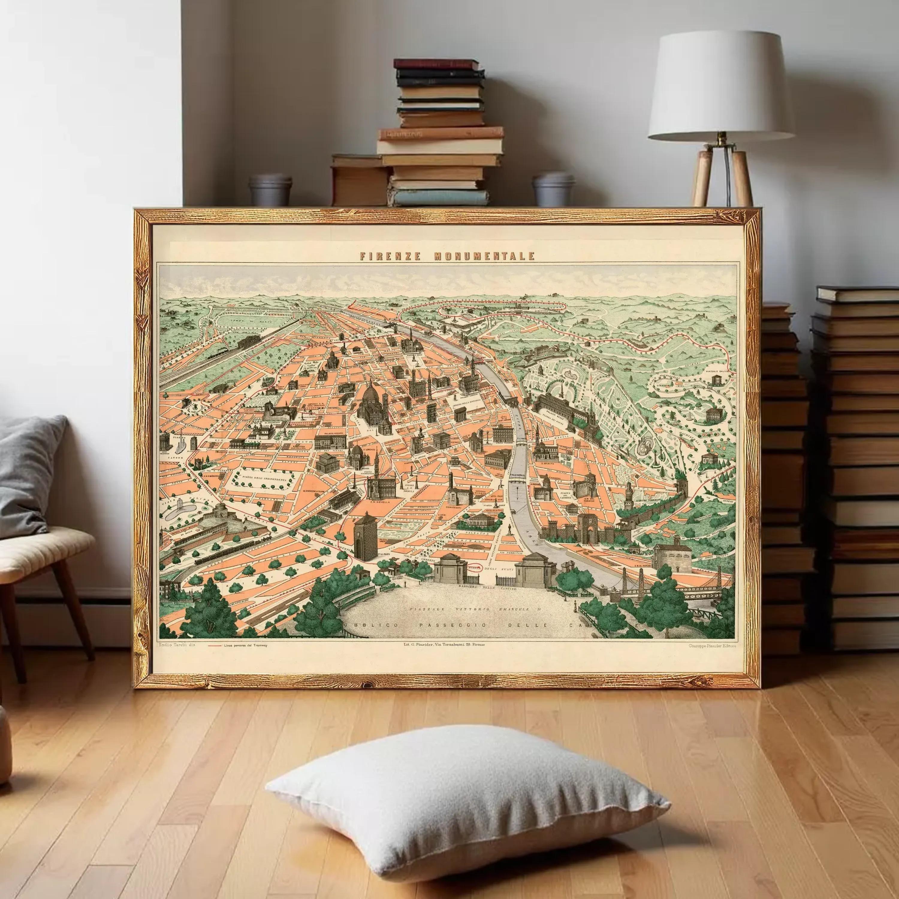 a large framed map of Florence, Italy, with a wooden floor and a stack of books in the background.