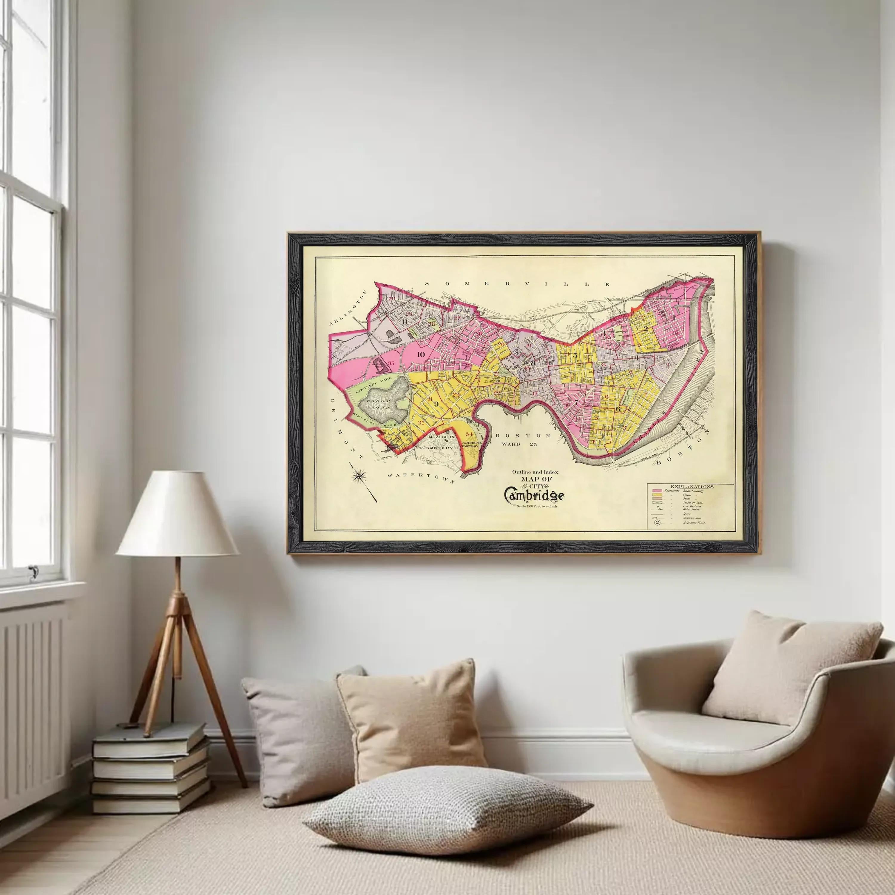 The image is a framed vintage map of Cambridge, England, depicting the city's layout and surrounding areas.