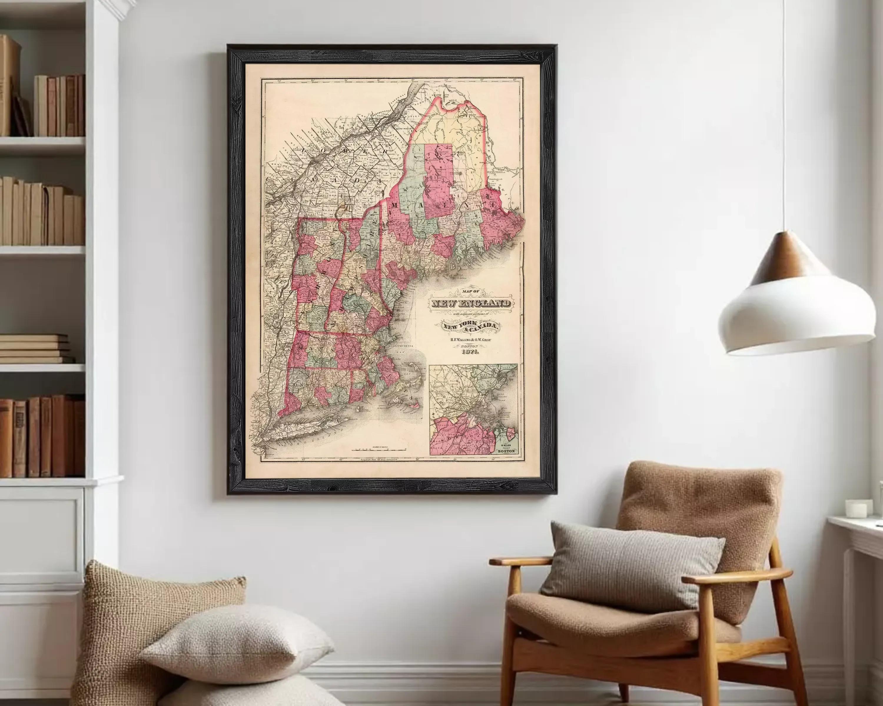 The image is a framed vintage map of New England, depicting the region in a detailed and colorful manner.