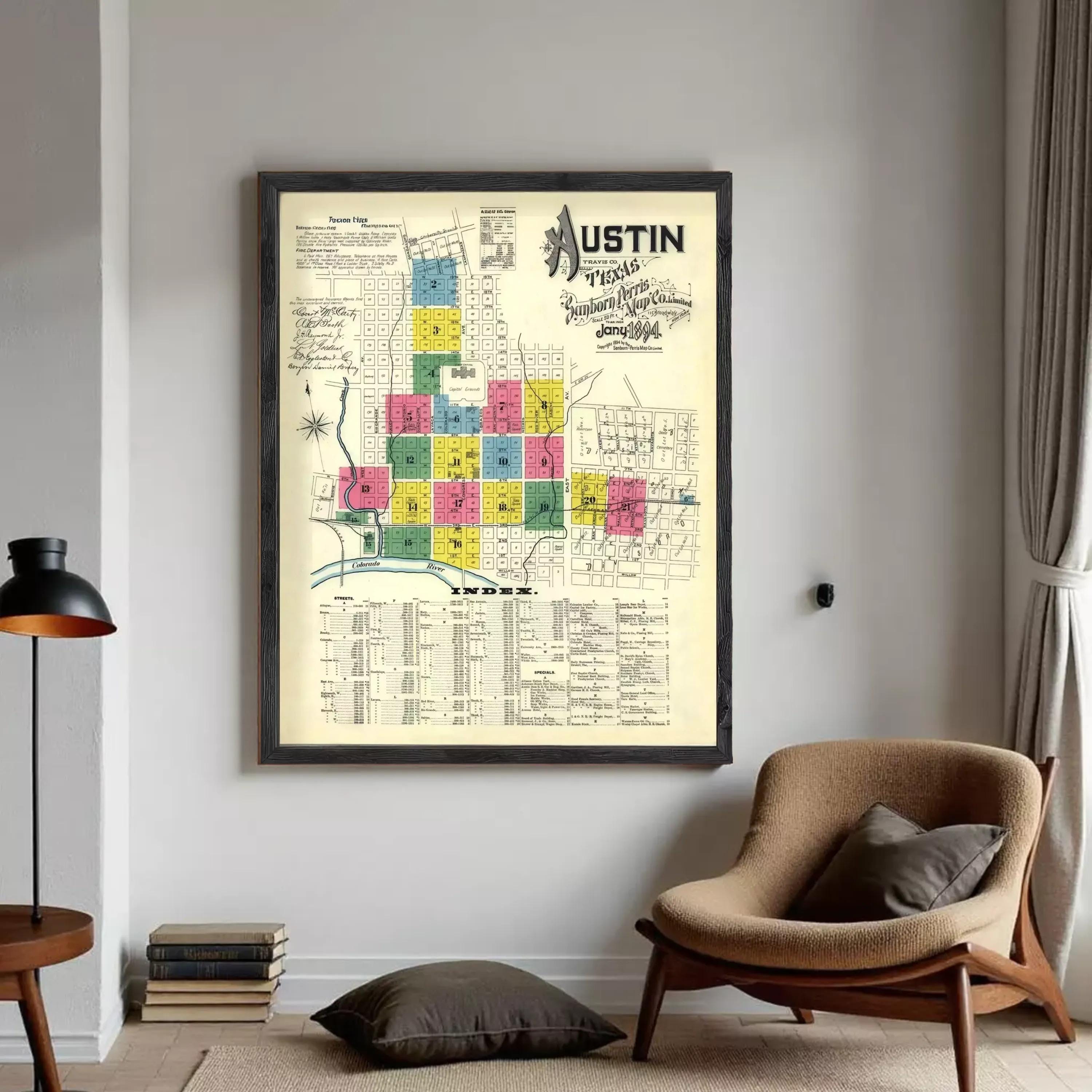 The image is a framed vintage map of Austin, Texas, depicting the city's layout and surrounding areas.
