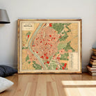 The image is a framed vintage map of the city of Seville, Spain, depicting the city's layout and surrounding areas.