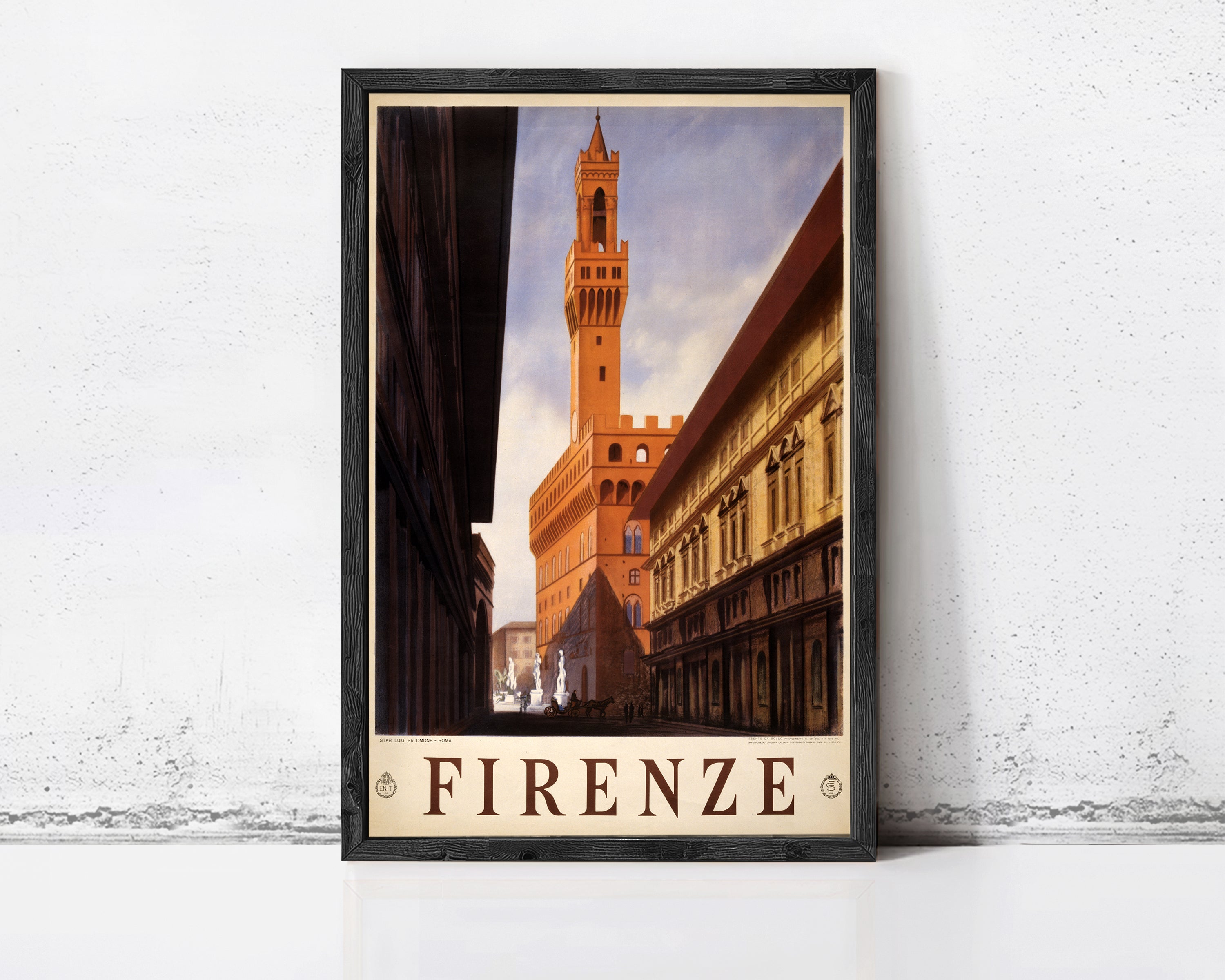 A framed poster of the Florence Cathedral, also known as the Piazza del Duomo, with the word "FIRENZE" prominently displayed.
