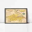 The image is a framed vintage map of Philadelphia, Pennsylvania, with a black border and yellow and brown color scheme.