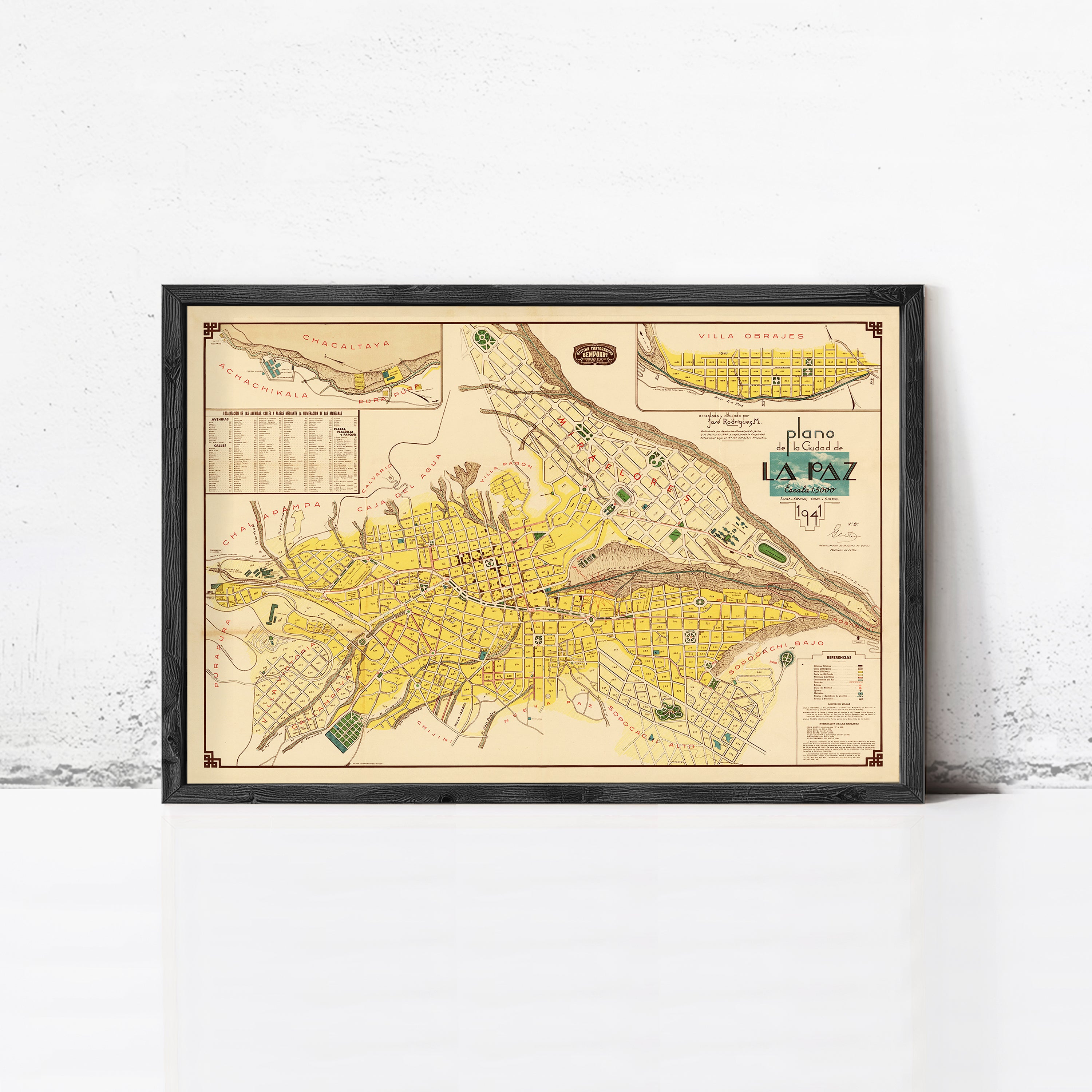 The image is a framed vintage map of Philadelphia, Pennsylvania, with a black border and yellow and brown color scheme.