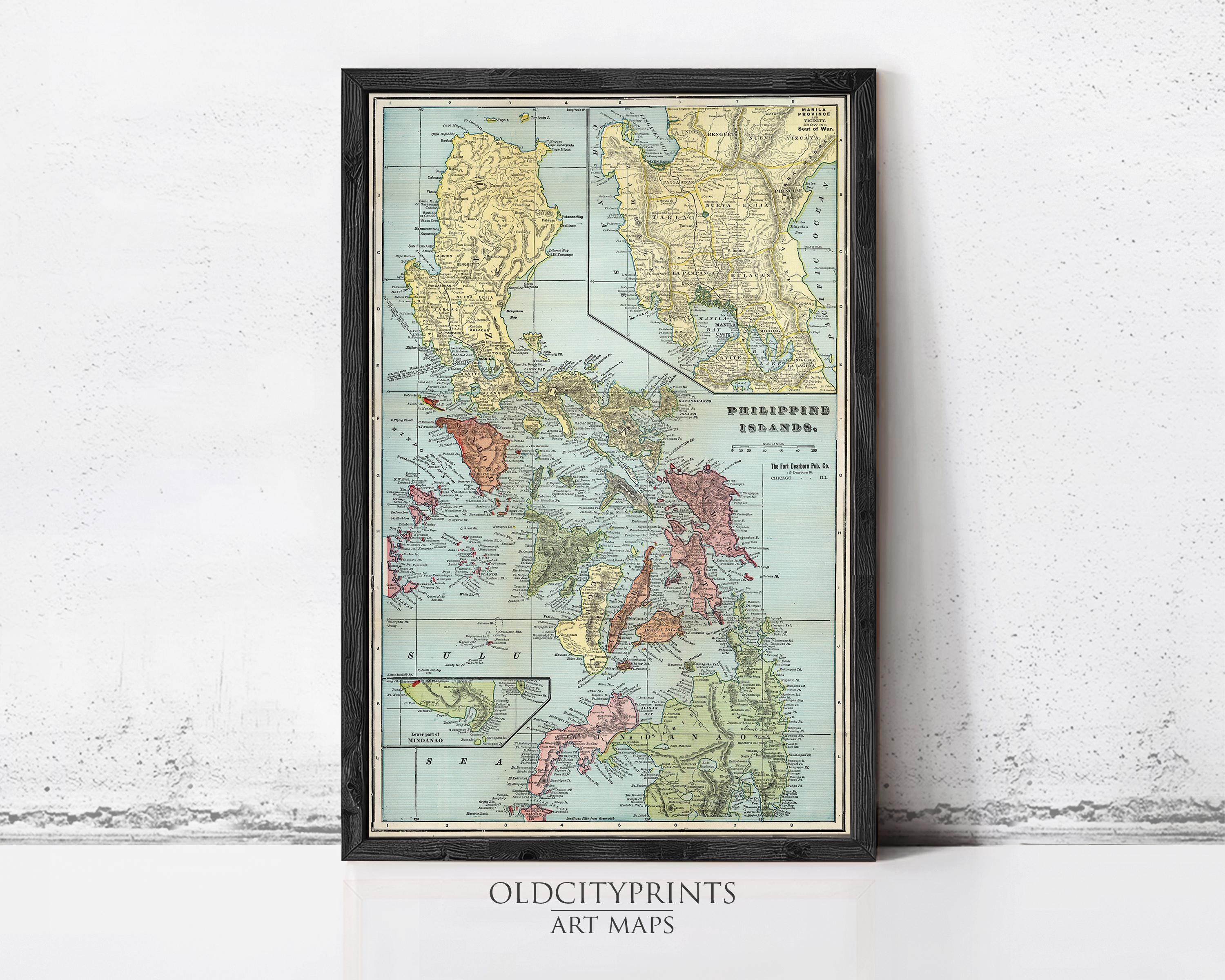 The image is a framed vintage map of the Philippines, depicting the country's islands and surrounding areas.