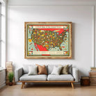 A framed illustration of a colorful map of the United States, depicting various food-related icons and labels.