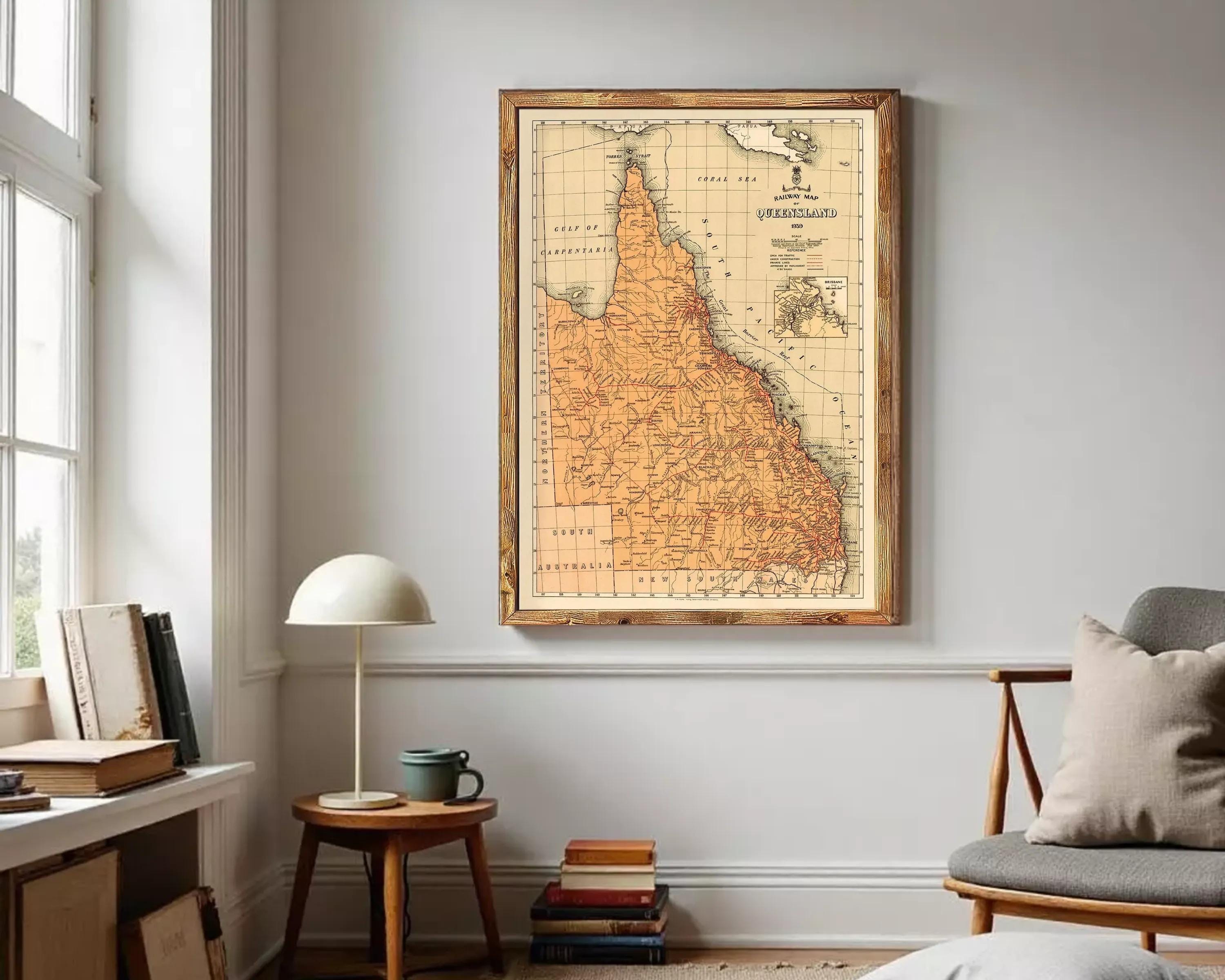 The image is a framed vintage map of the Queensland region of Australia, depicting the state's geographical layout and boundaries.