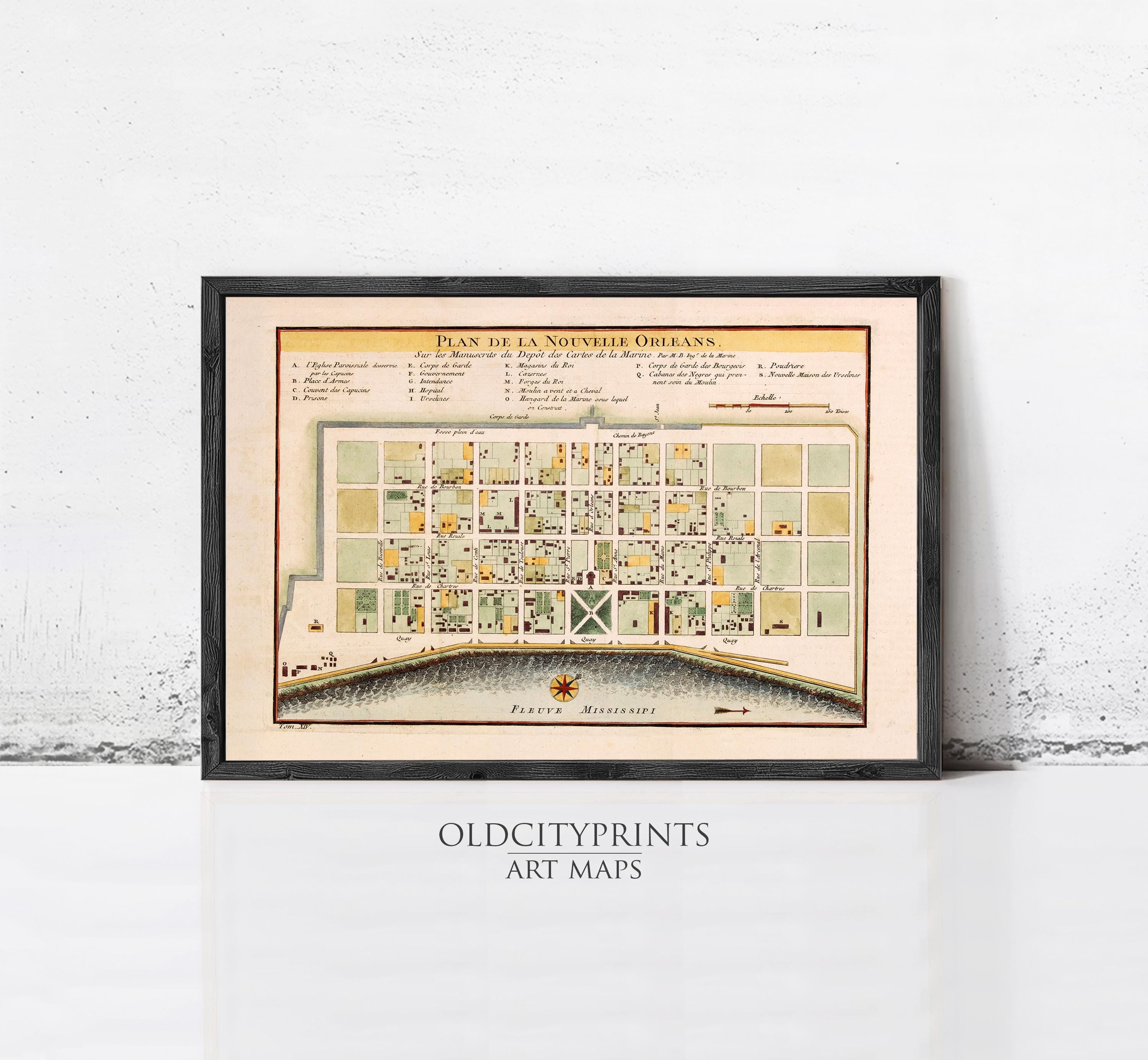 The image is a framed vintage map of the city of Orleans, Louisiana, depicting a detailed layout of the city's streets and buildings.