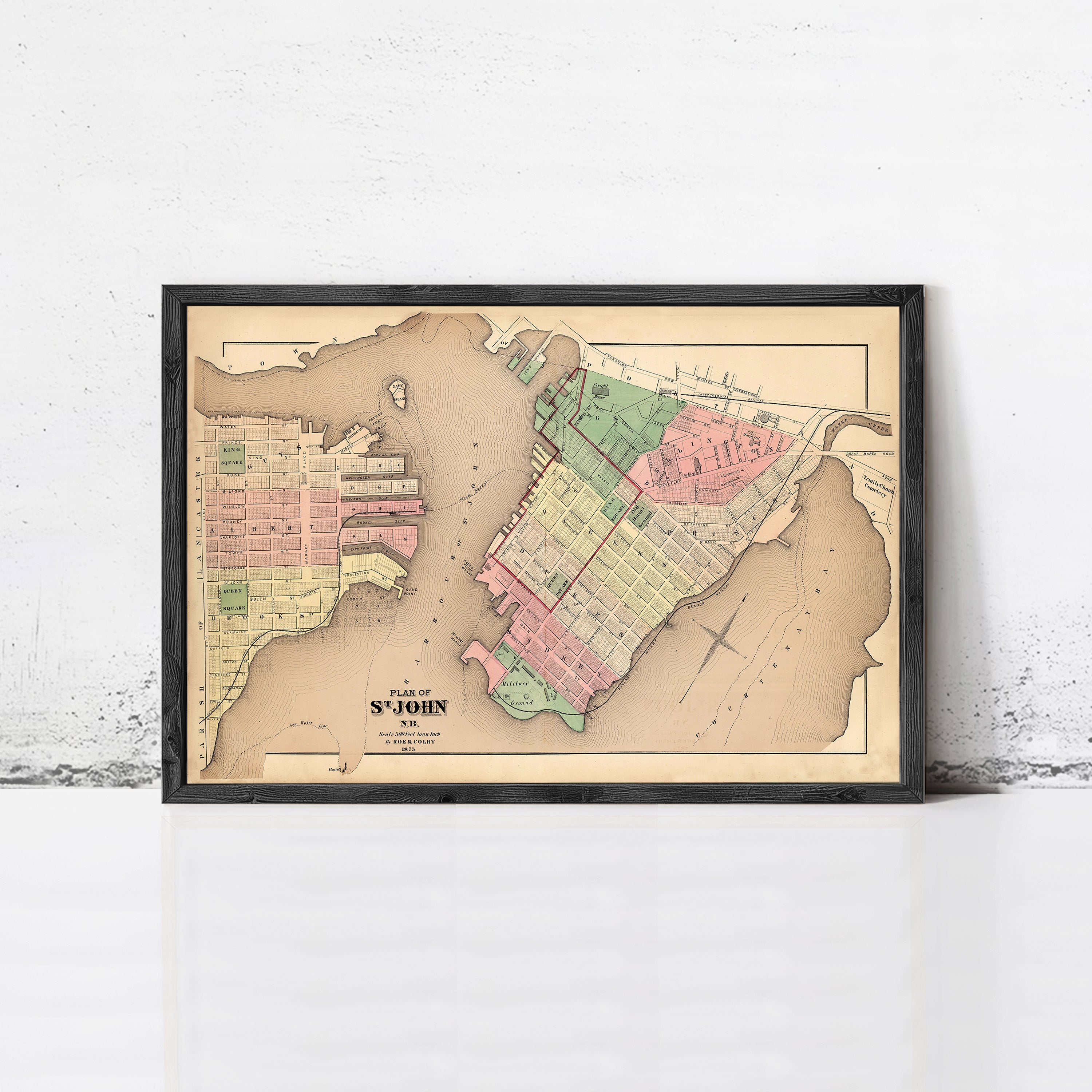 The image is a framed map of the city of St. John, New York, dated 1873.