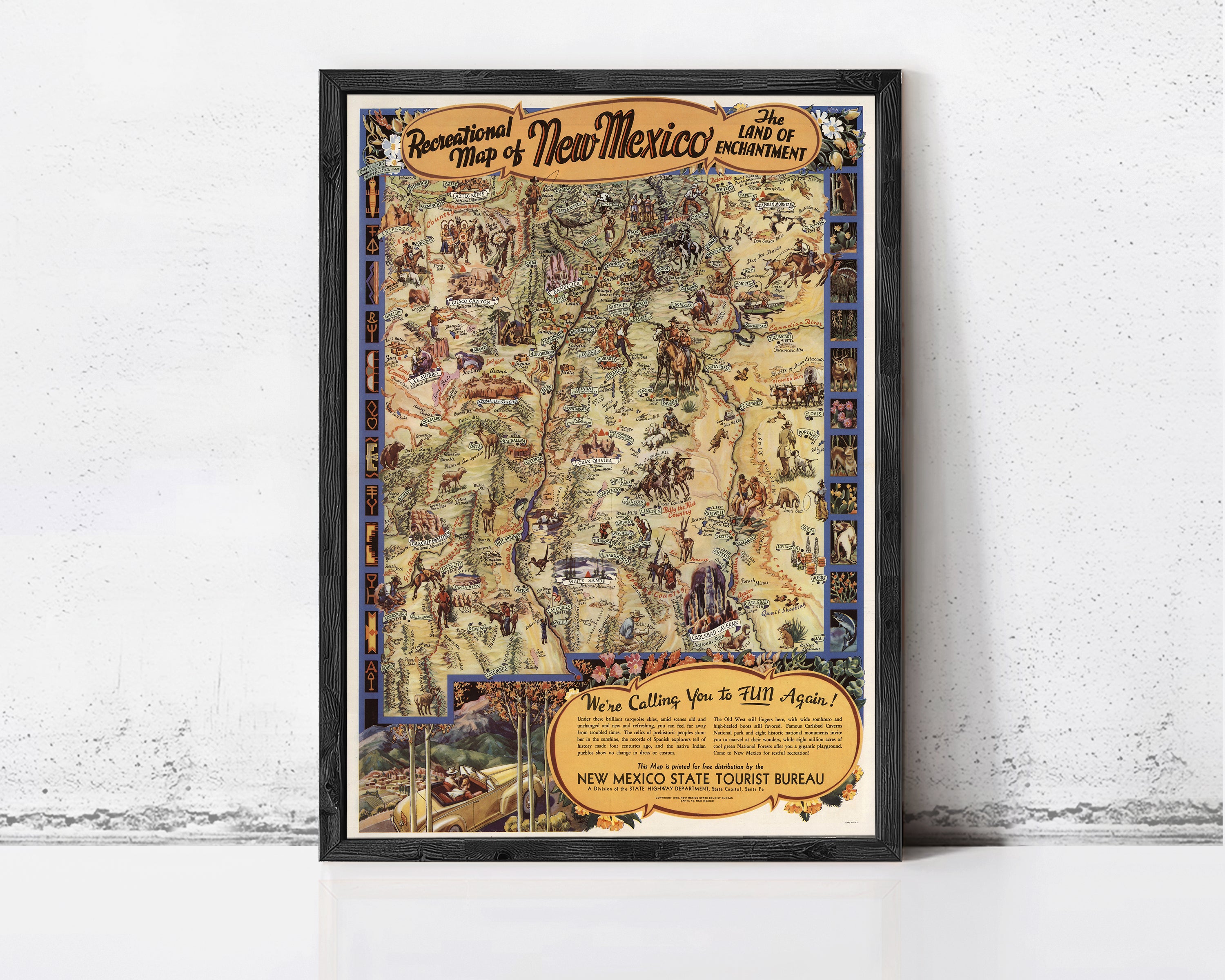The image is a framed vintage map of New Mexico, depicting various landmarks and locations across the state.