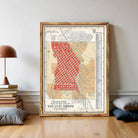 The image is a framed vintage map of San Luis Obispo, California, depicting a detailed street layout and surrounding areas.