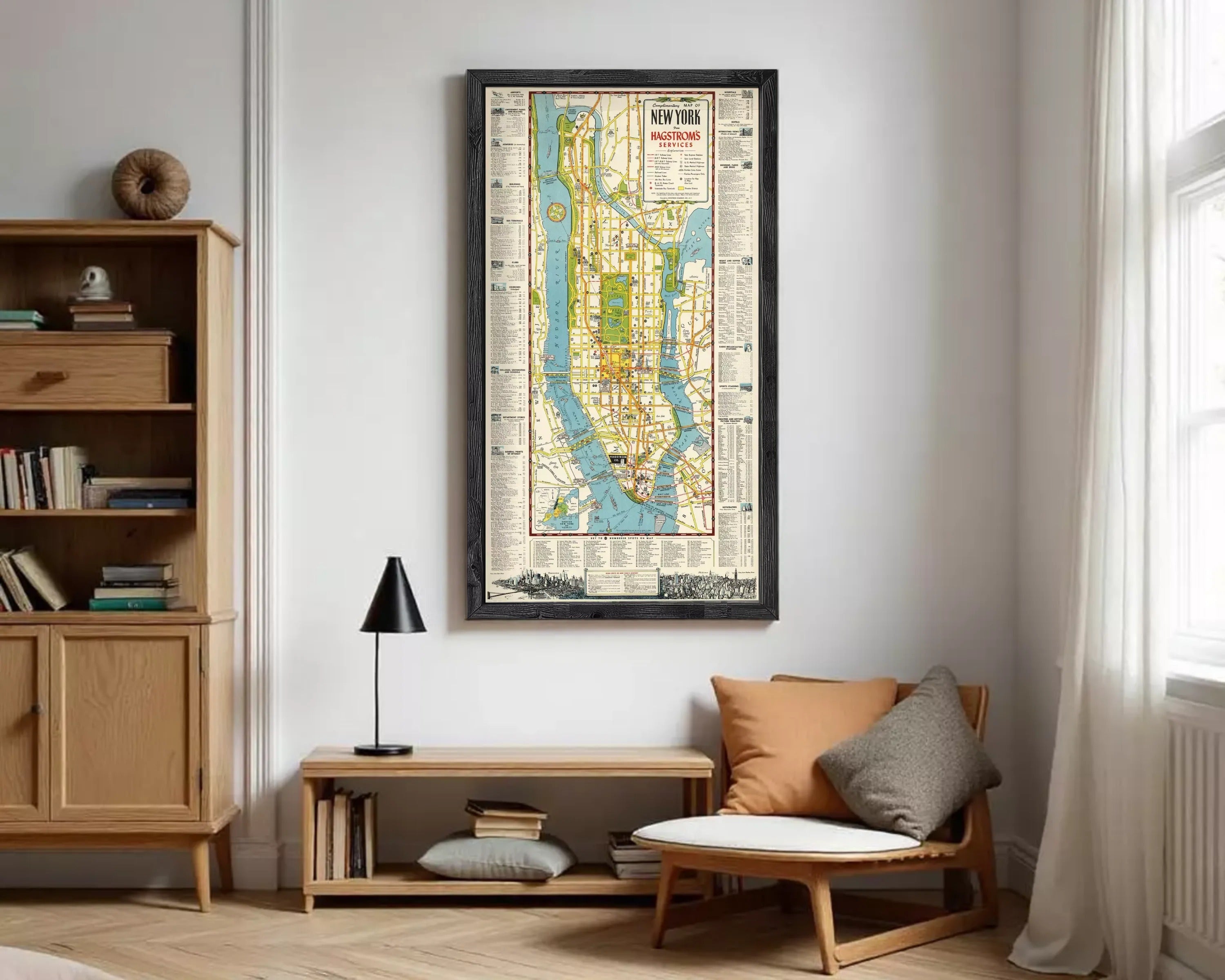 The image is a framed vintage map of New York City, depicting the city's streets, landmarks, and waterways.