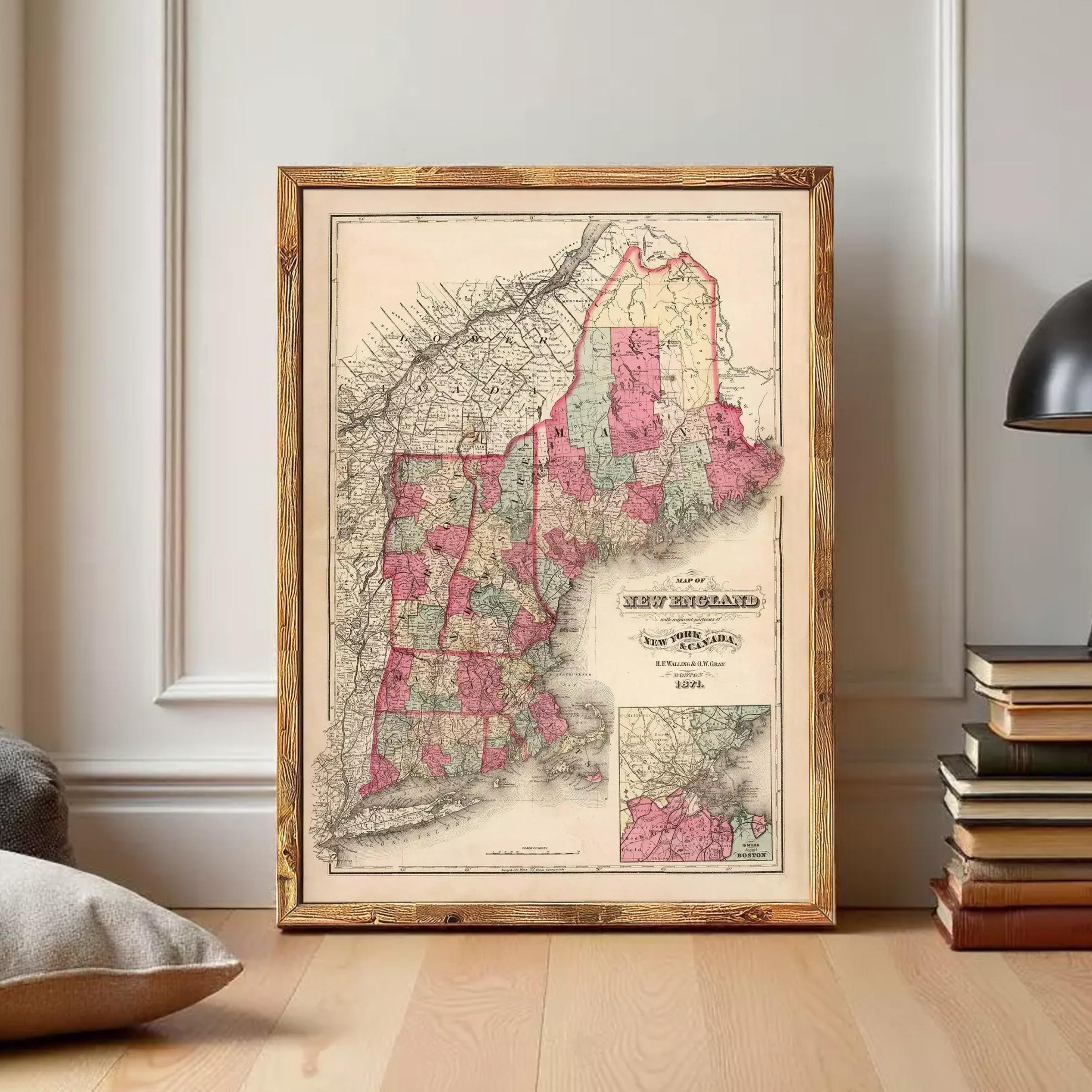 The image is a framed vintage map of New England, depicting the region in a detailed and colorful manner.