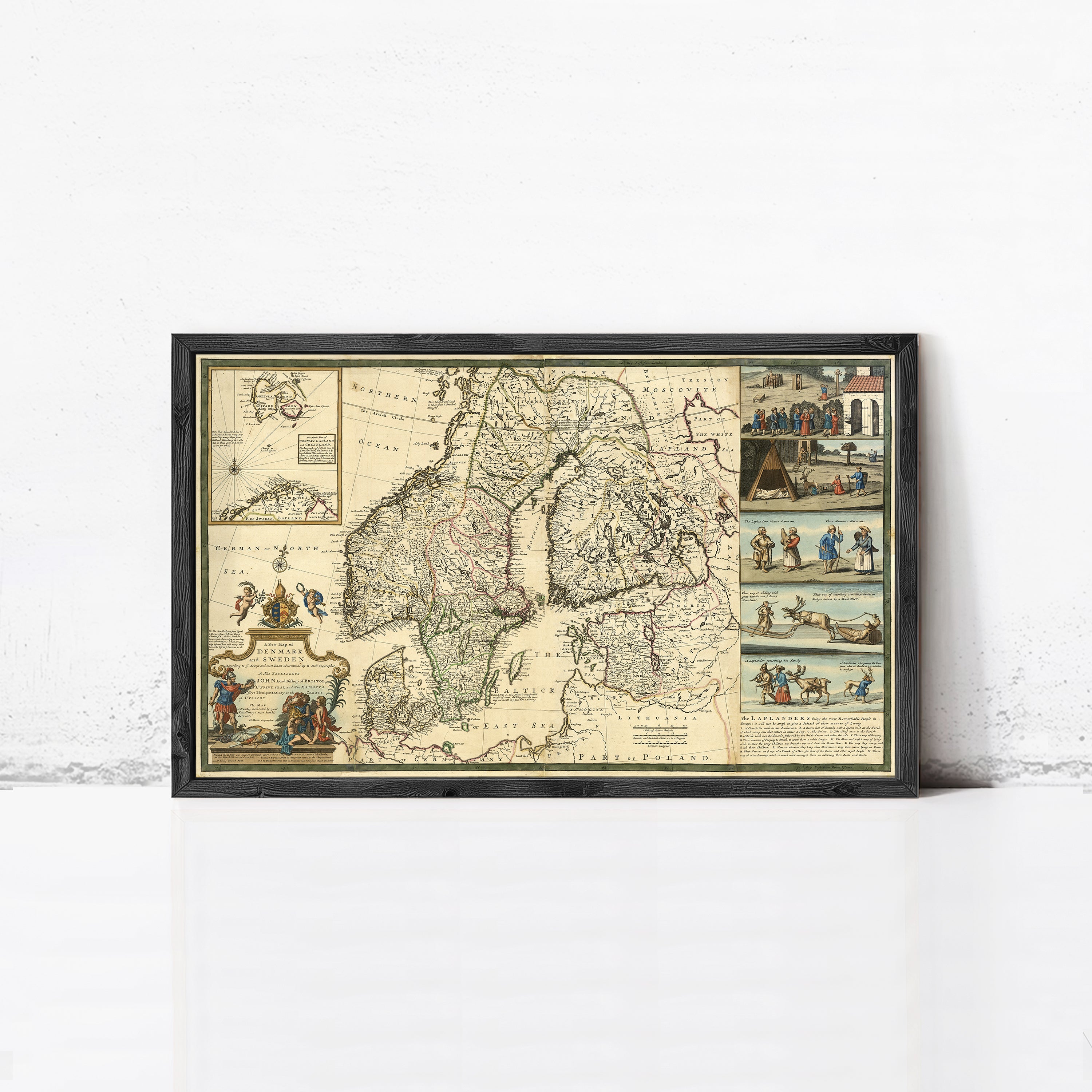 The image is a framed antique map of Europe, depicting various regions and landmarks.