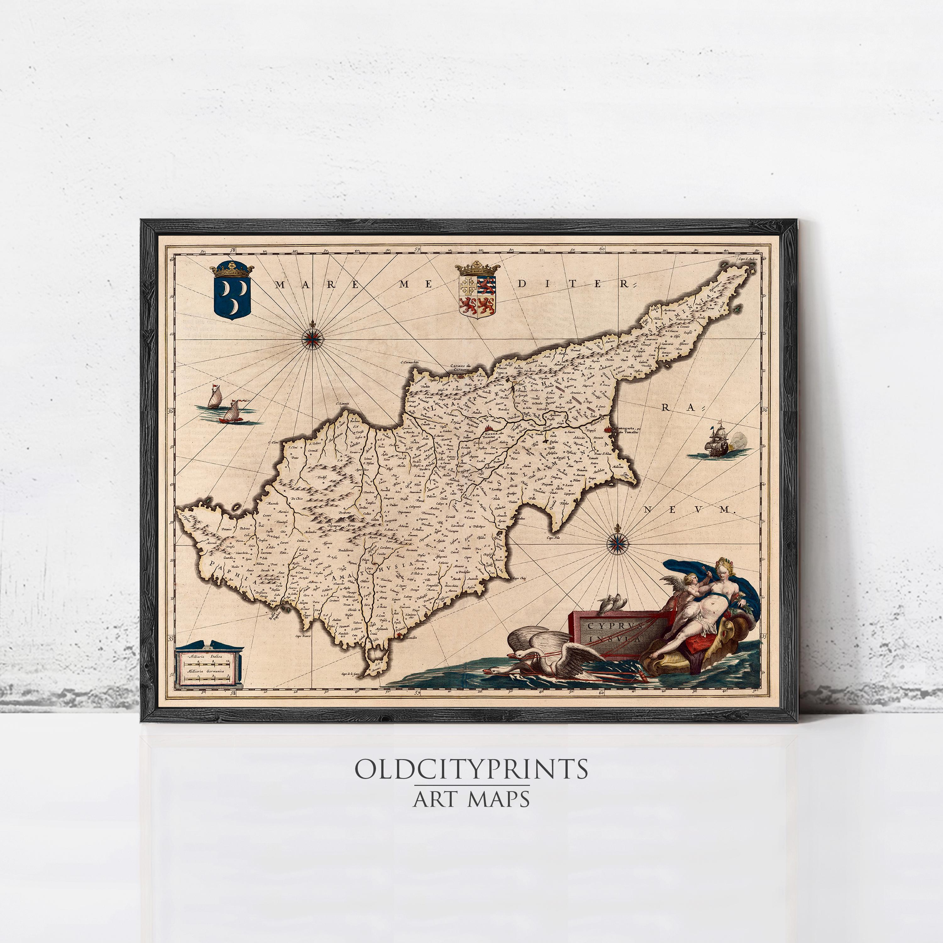 The image is a framed antique map of the island of Cyprus, depicting various landmarks and geographical features.