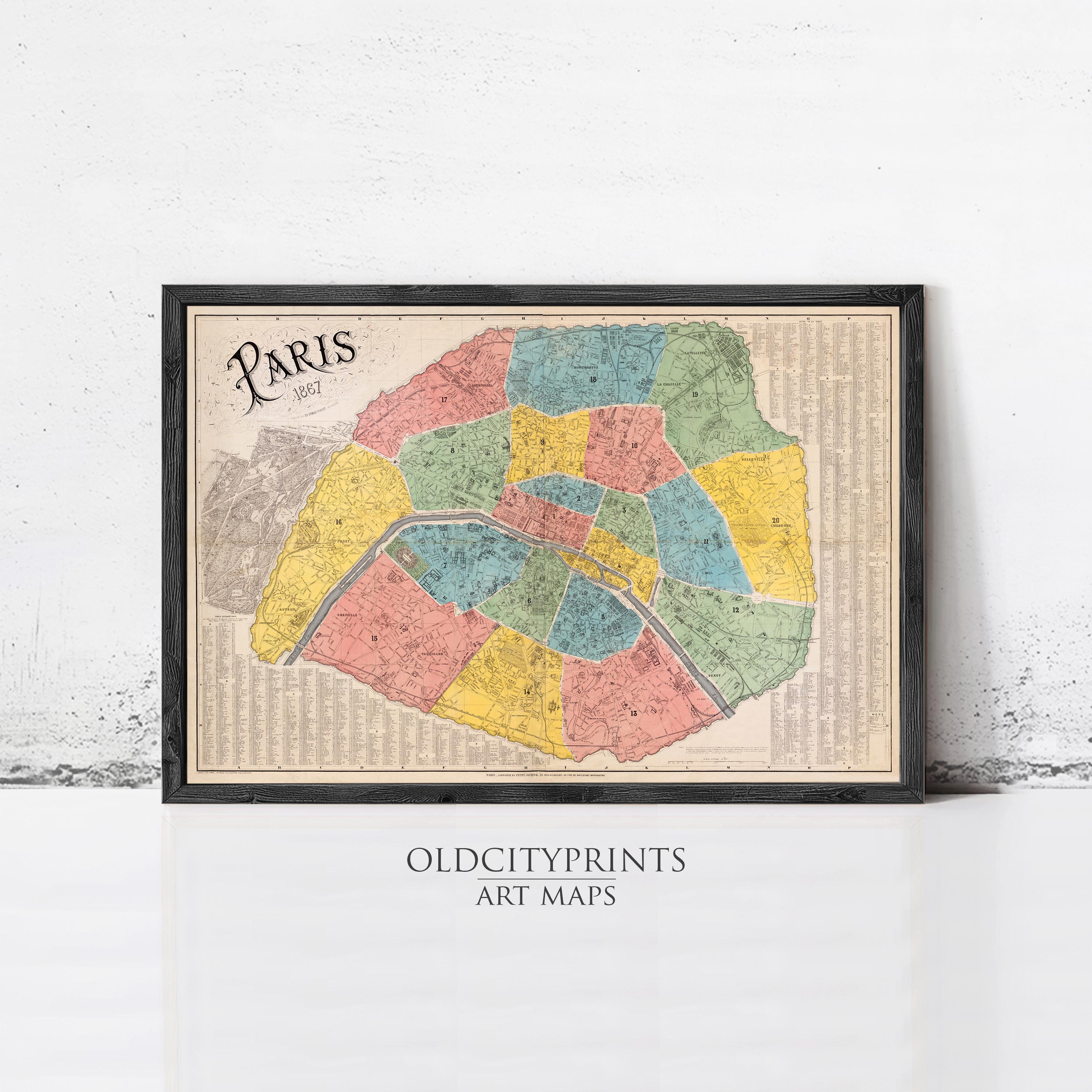 The image is a framed vintage map of Paris, France, depicting the city in a colorful and detailed manner.