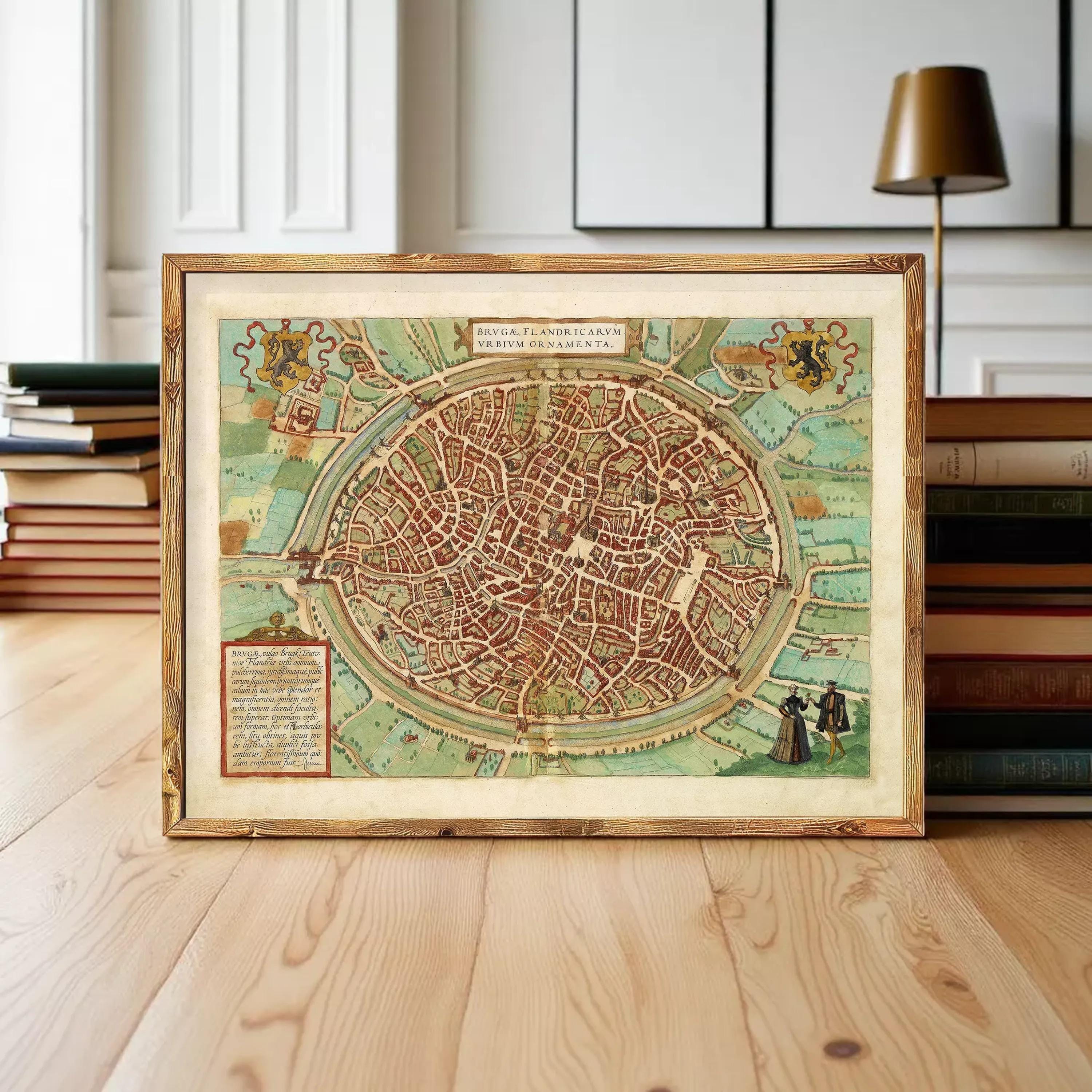 A framed map of a city, likely a historical or geographical map, is displayed on a wooden surface in front of a stack of books.