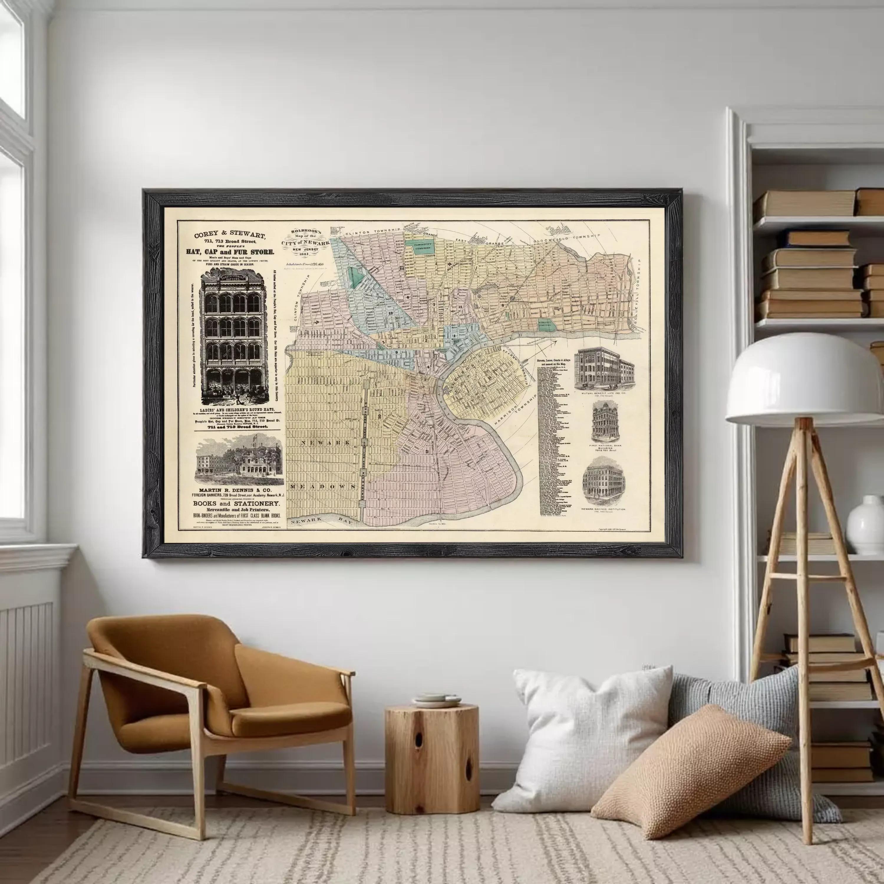 The image is a framed vintage map of a city, likely from the early 20th century, depicting various buildings and streets.