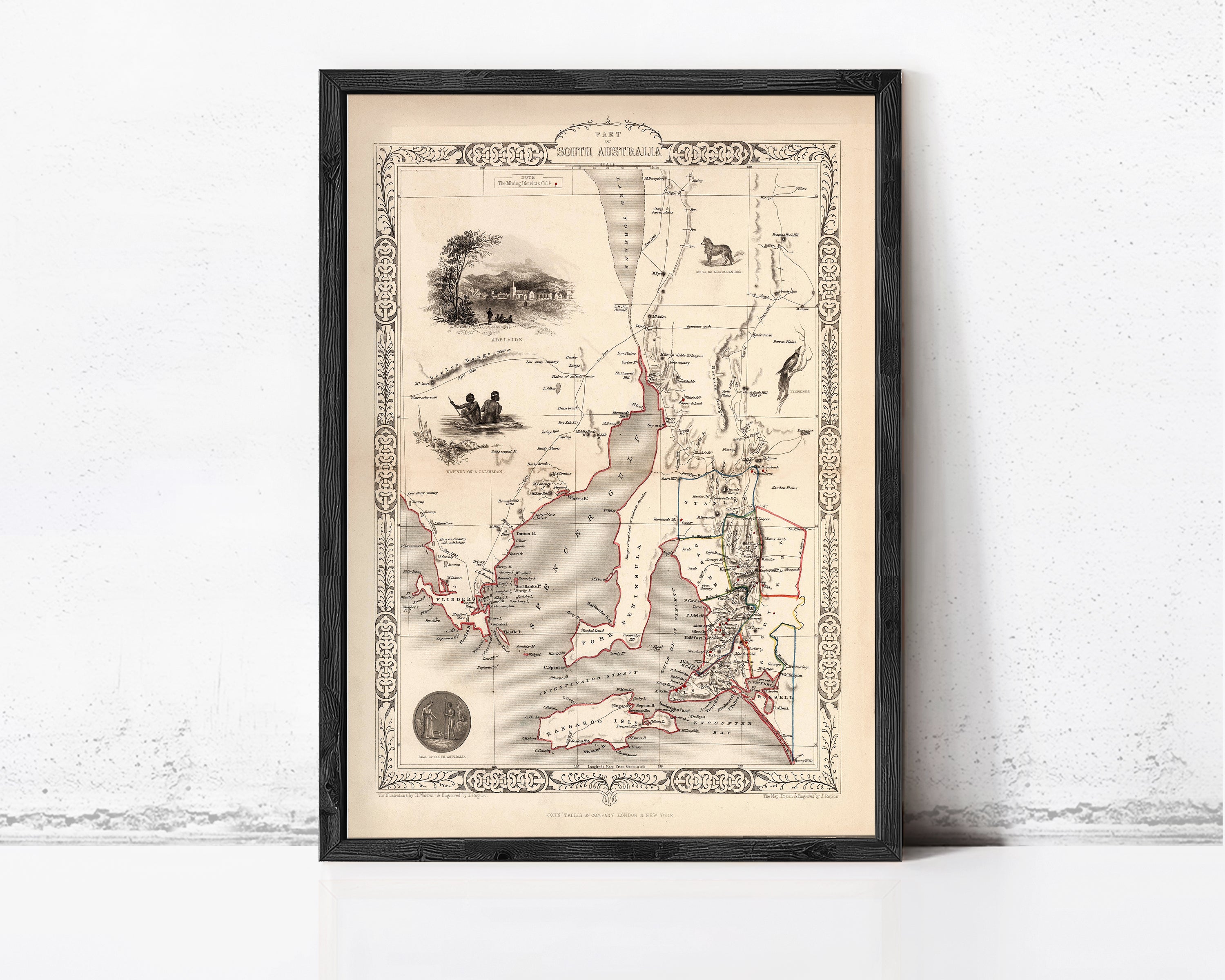 The image is a framed vintage map of the South Australia region, featuring detailed illustrations and geographical information.