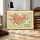 The image is a framed vintage map of Clermont-Ferrand, France, depicting the city's layout and surrounding areas.