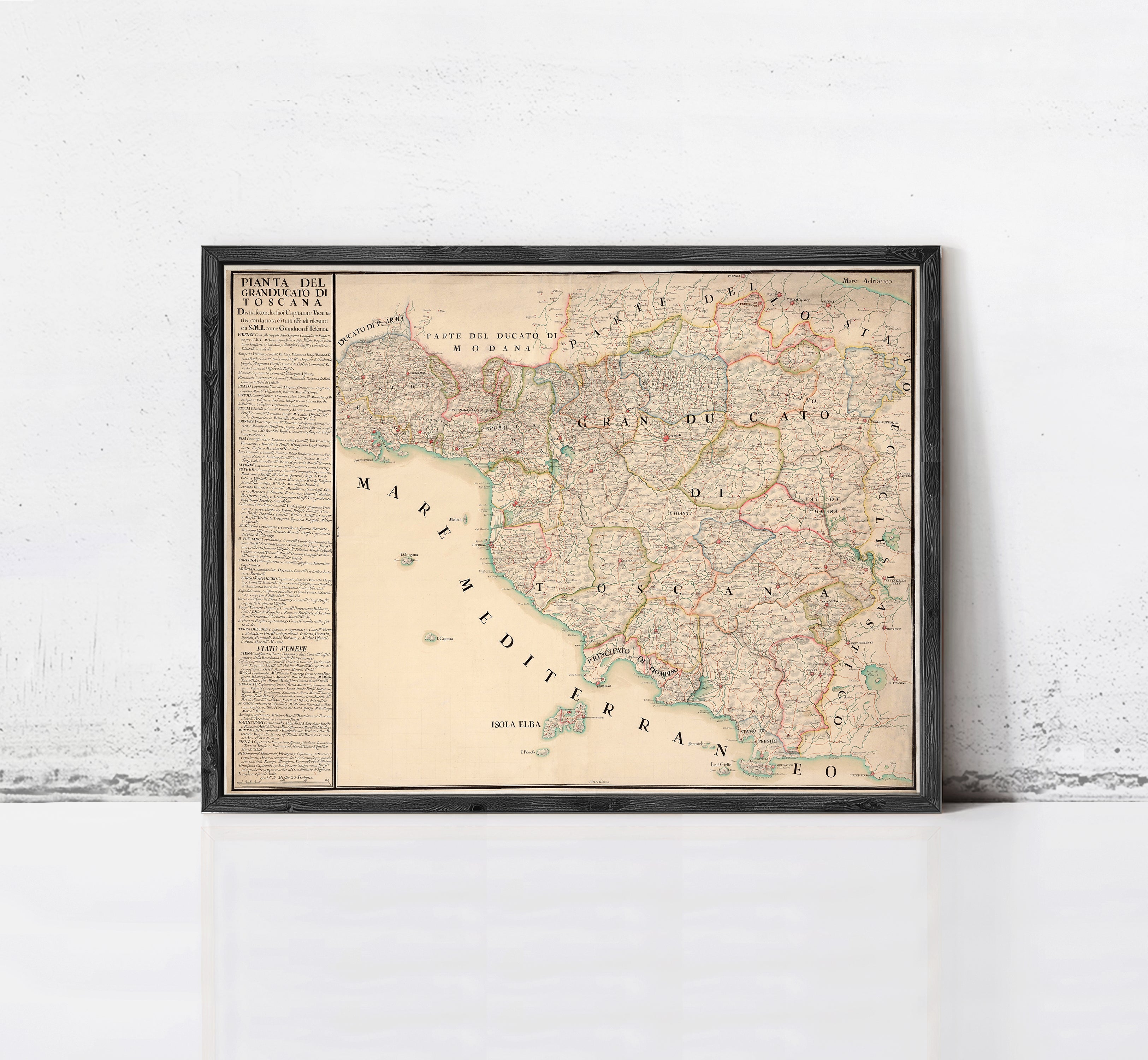 The image is a framed vintage map of Italy, showing the country's geographical layout and various regions.